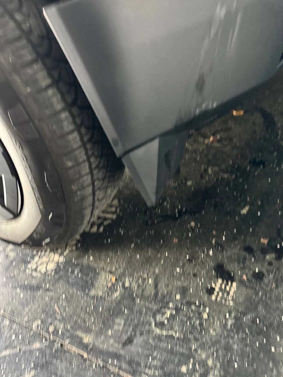 Tesla Cybertruck Tire hit CT busted front wheel fairing and plastic undercarriage IMG_8641