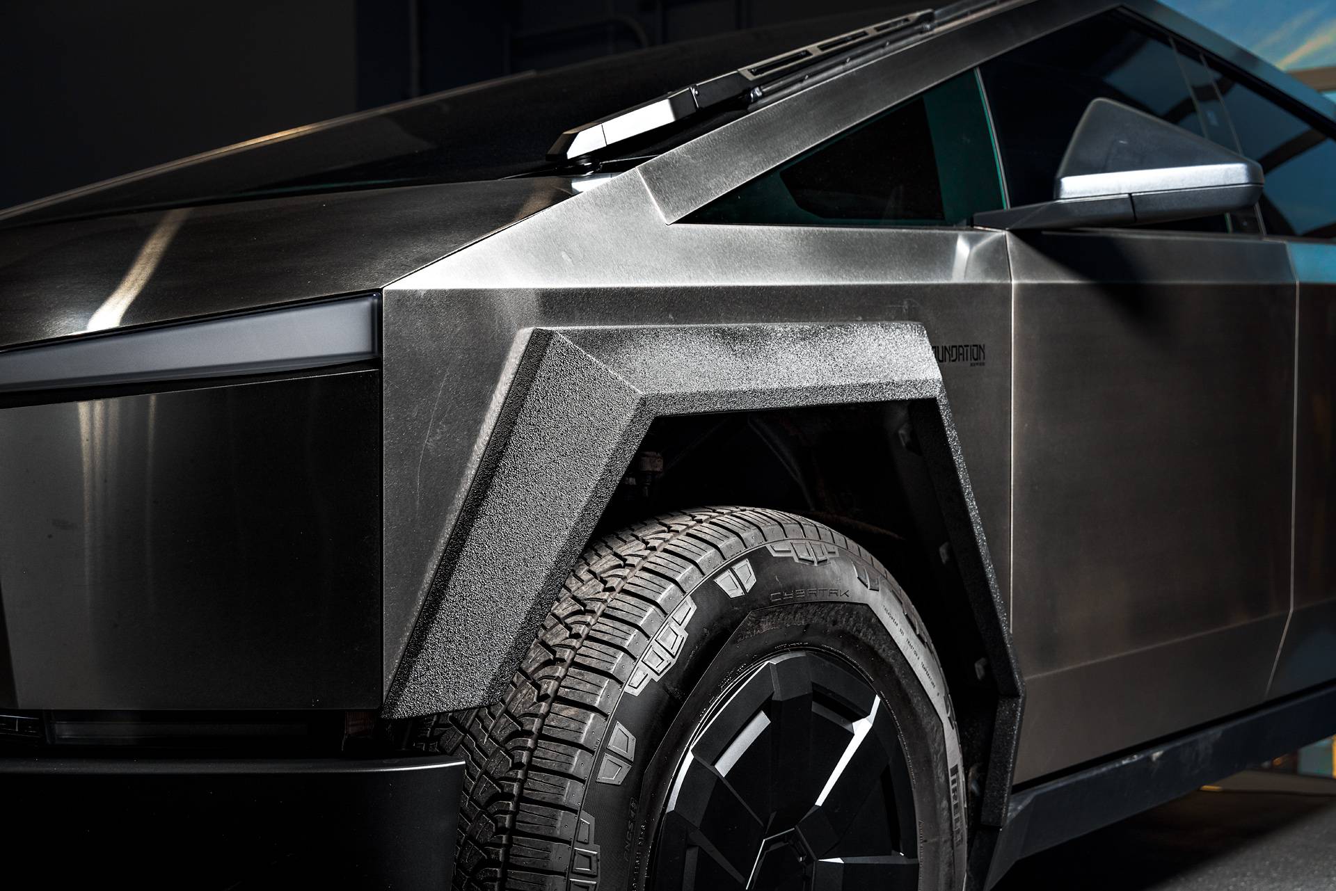 Tesla Cybertruck Unplugged Performance Cybertruck Wide Fender Flares - Bed Liner Finish Tesla Cybertruck Lug Nut Set 24pc Forged Aluminum Black UP-03 Beadlock Forged Wheels Carbon Fi