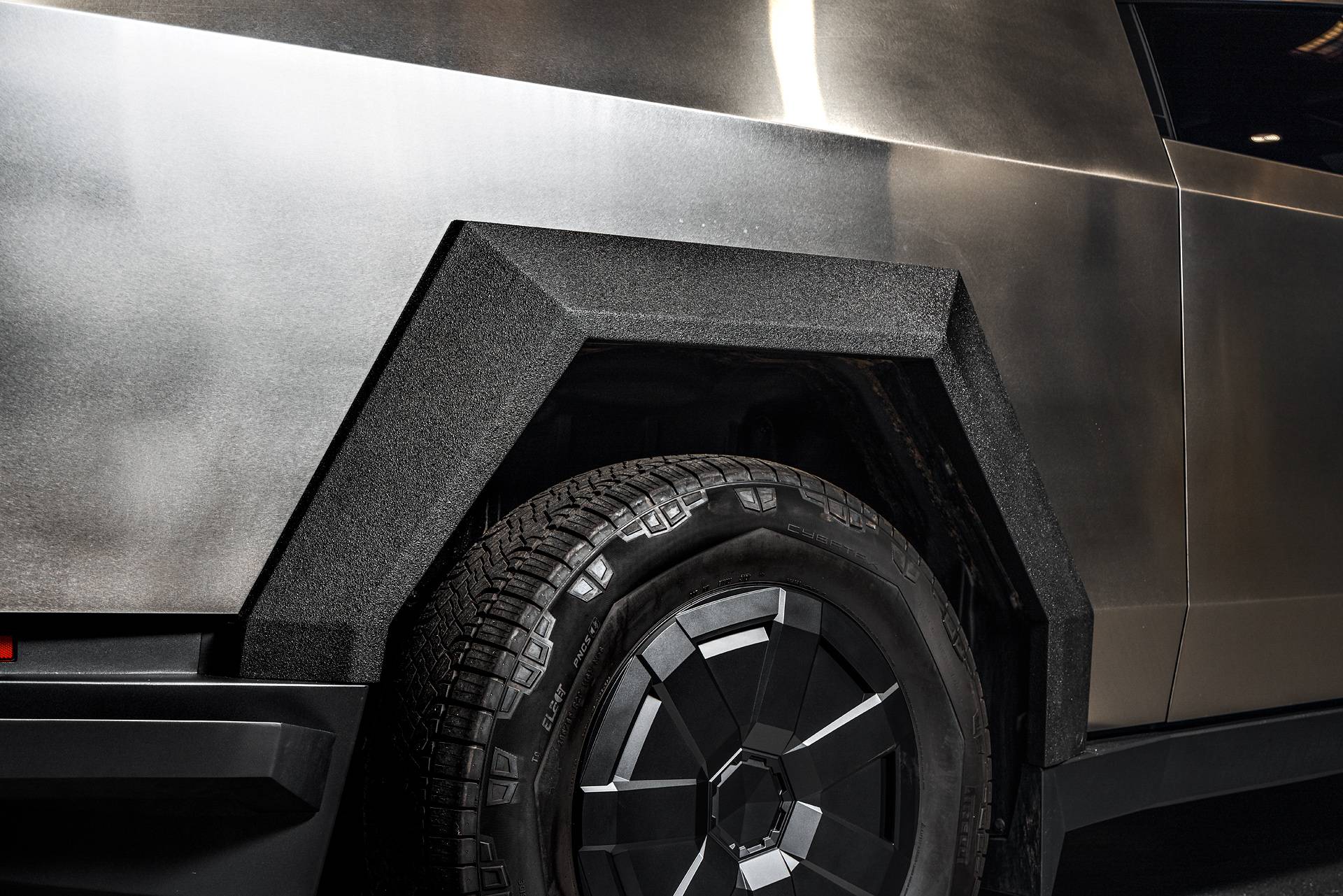 Tesla Cybertruck Unplugged Performance Cybertruck Wide Fender Flares - Bed Liner Finish Tesla Cybertruck Lug Nut Set 24pc Forged Aluminum Black UP-03 Beadlock Forged Wheels Carbon Fi
