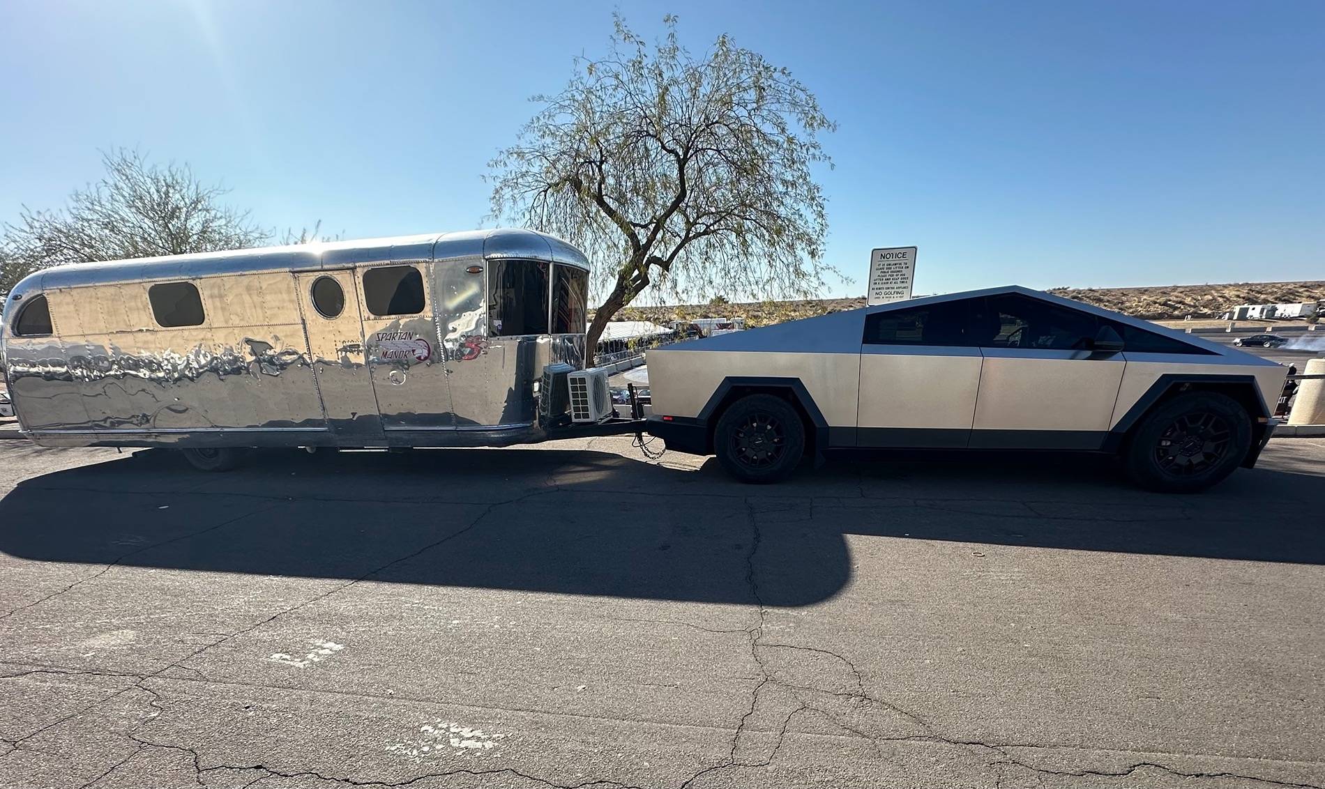 Tesla Cybertruck CyberTruck towing my 1946 spartan Manor camp trailer IMG_3237