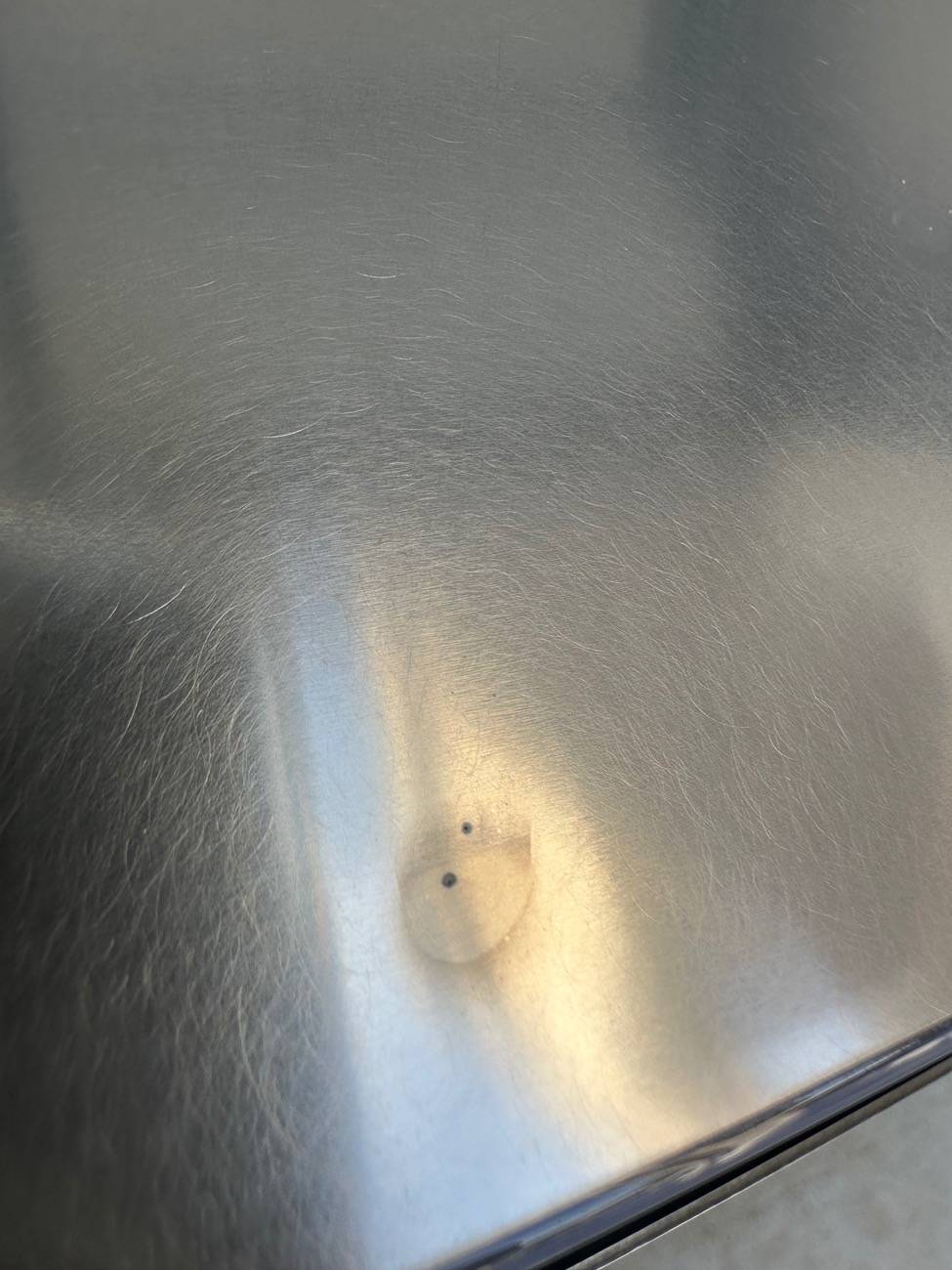 Tesla Cybertruck Rust? Hard water? Rail dust showing up 6 months later? I’m lost. IMG_1374