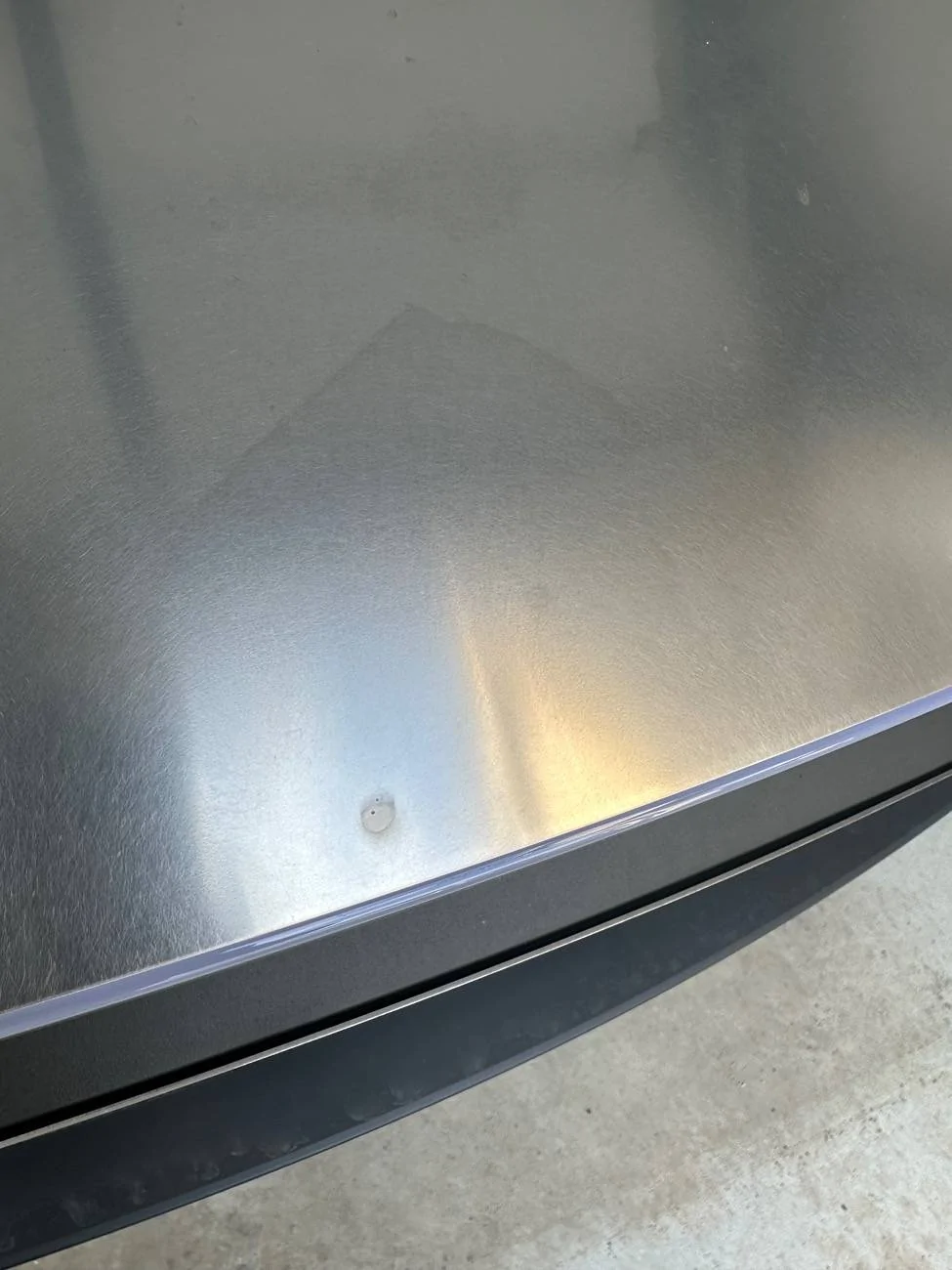 Tesla Cybertruck Rust? Hard water? Rail dust showing up 6 months later? I’m lost. IMG_1373