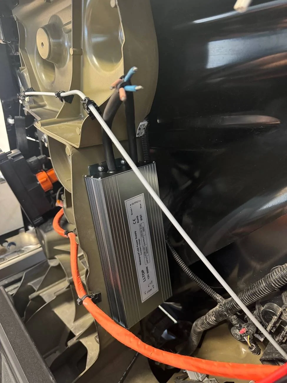 Tesla Cybertruck 110V to 12V ac to dc converter question IMG_9682