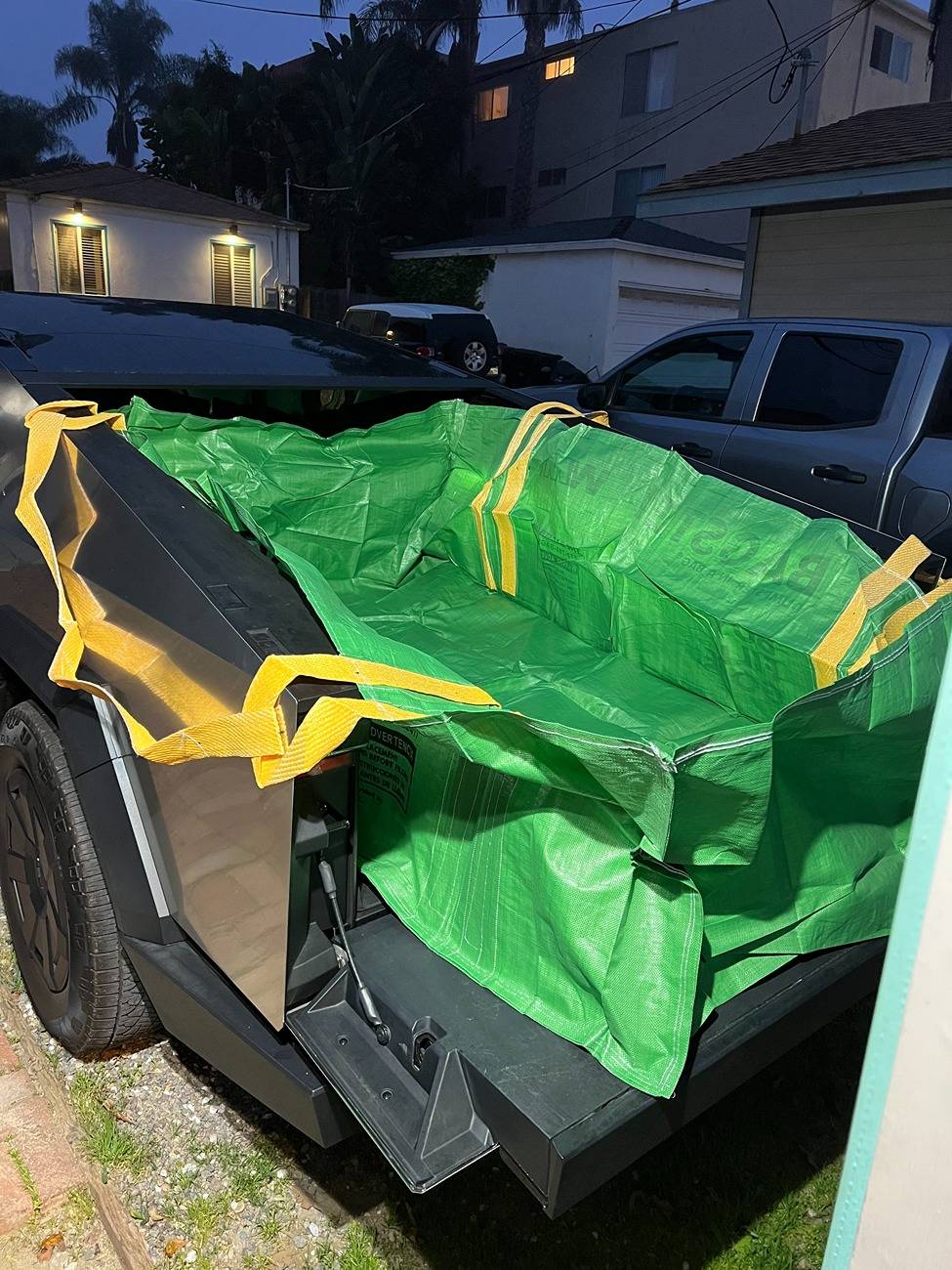 Tesla Cybertruck Heavy Duty Bed Liner - DIY hack using "Bagster - Dumpster in a Bag" bagster_tailgate