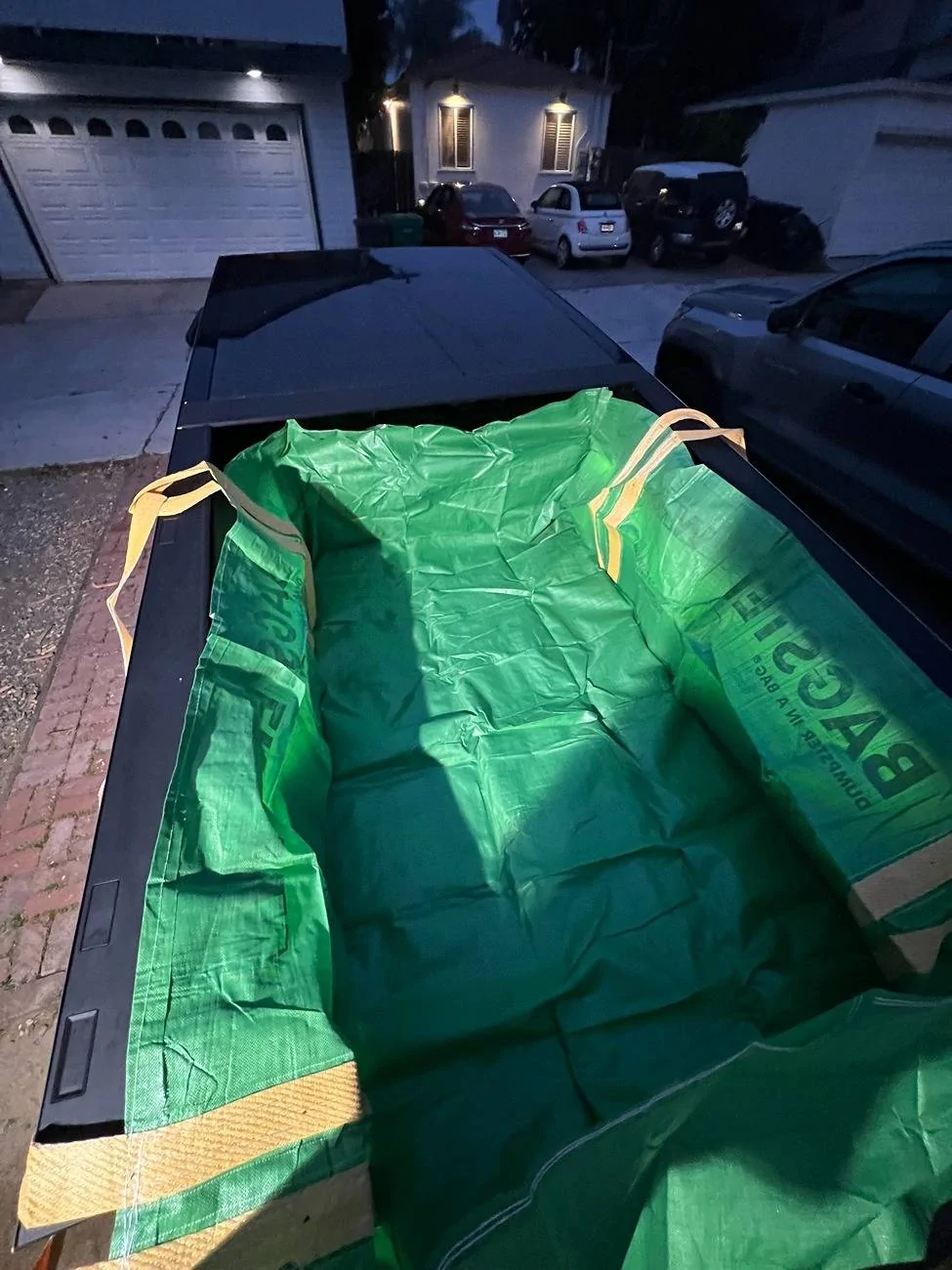 Tesla Cybertruck Heavy Duty Bed Liner - DIY hack using "Bagster - Dumpster in a Bag" bagster_in_bed