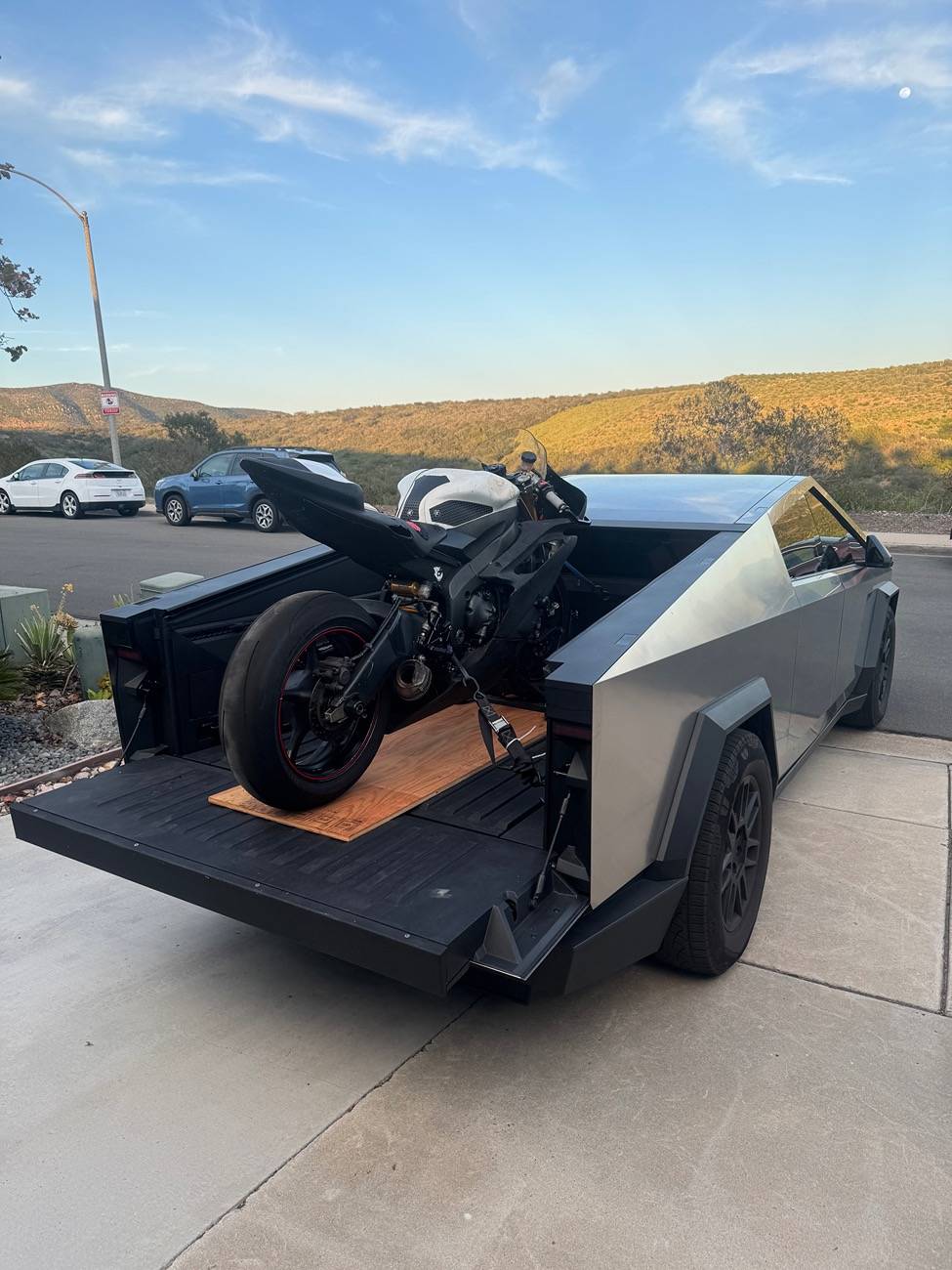 Tesla Cybertruck Ducati Panigale successfully loaded in CT! Post your motorcycles in bed IMG_2906