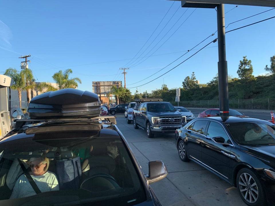 Tesla Cybertruck Poll - Have you ever ran out of charge or gas? line of cars at silvas