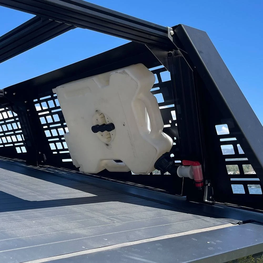 cybertruck-with-molle-panlel-roof-rack-from-cybertruckco-2.jpg