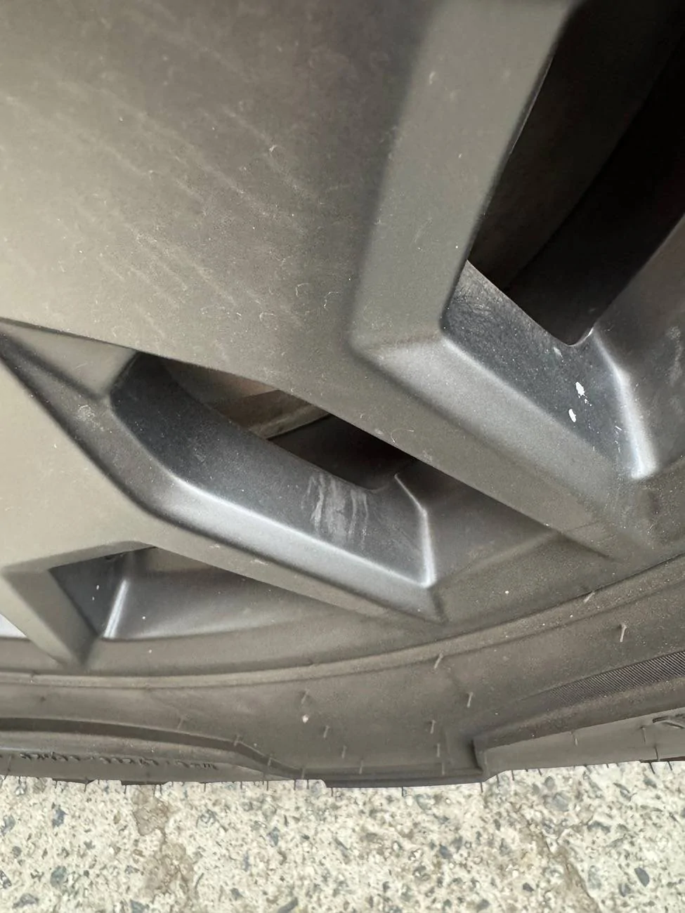 Tesla Cybertruck New wheel covers scratched all 4 of my rims IMG_7883