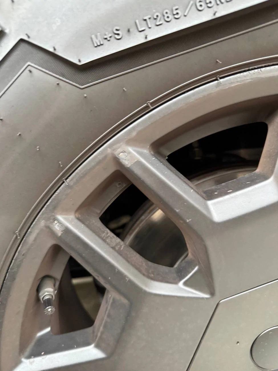 Tesla Cybertruck New wheel covers scratched all 4 of my rims IMG_7886