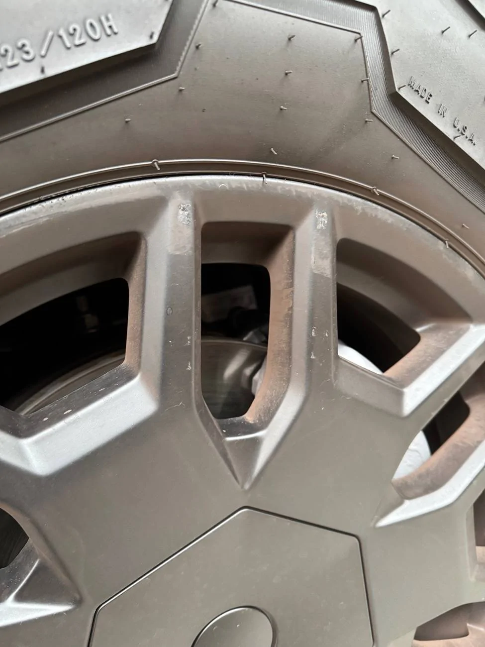 Tesla Cybertruck New wheel covers scratched all 4 of my rims IMG_7885