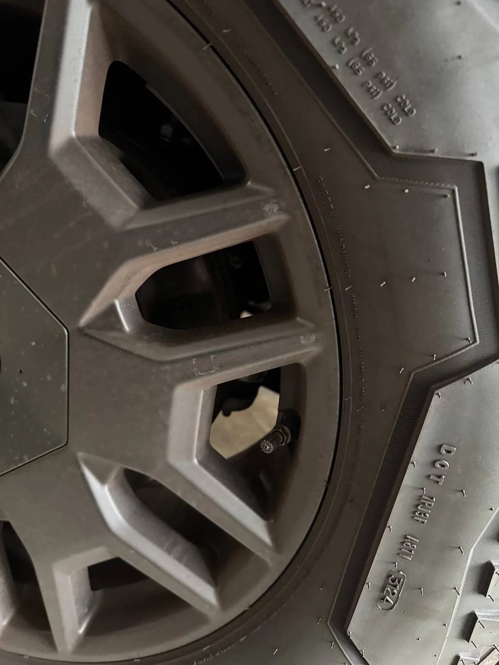 Tesla Cybertruck New wheel covers scratched all 4 of my rims IMG_7888