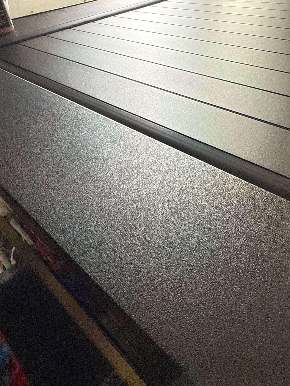 Tesla Cybertruck Scratches on vault tonneau cover & applique. Not sure what happened. image