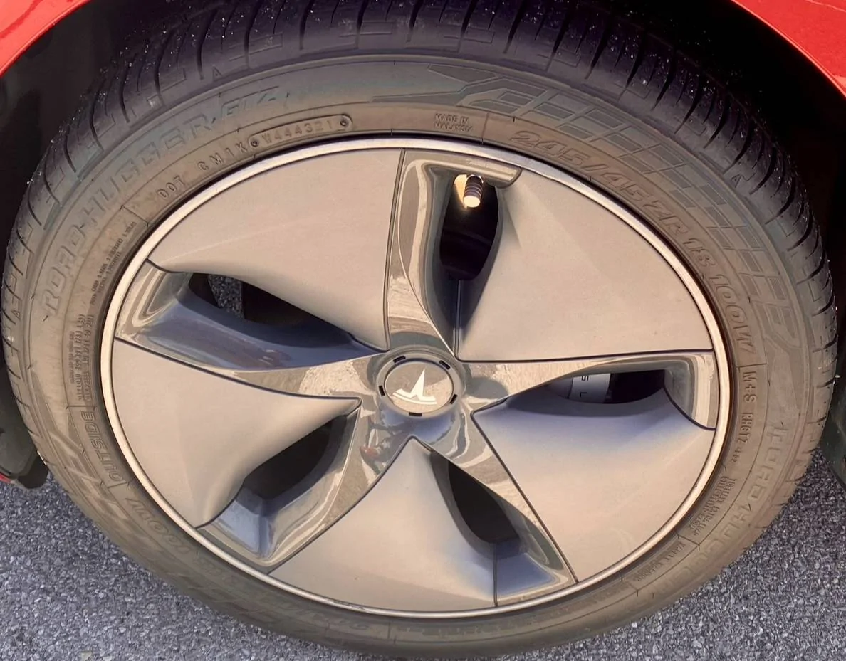 Tesla Cybertruck New wheel covers scratched all 4 of my rims IMG_0558
