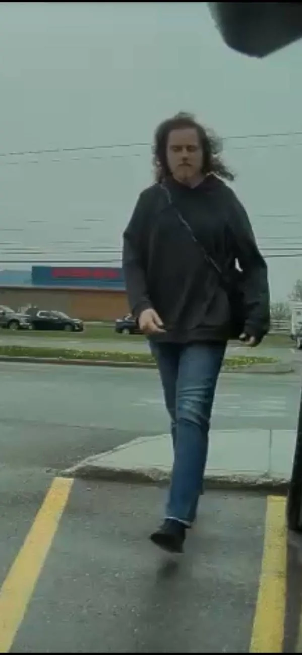 Tesla Cybertruck Help identify deranged Cybertruck vandal caught spitting on truck cybertruck spitter 1