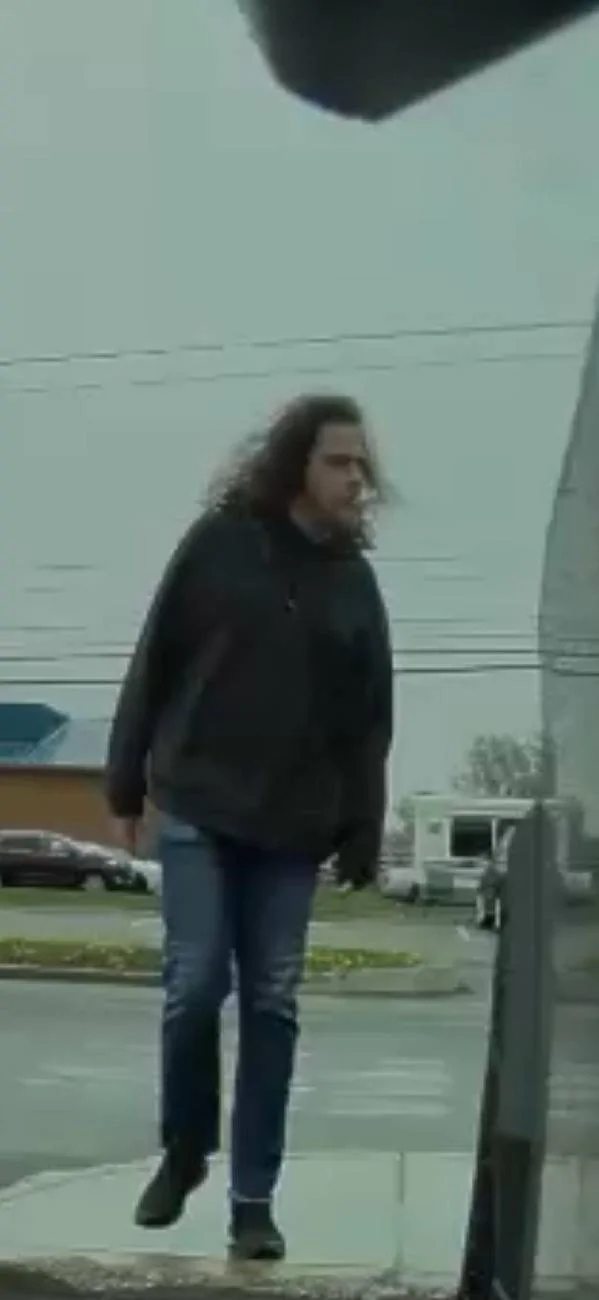 Tesla Cybertruck Help identify deranged Cybertruck vandal caught spitting on truck cybertruck spitter 2