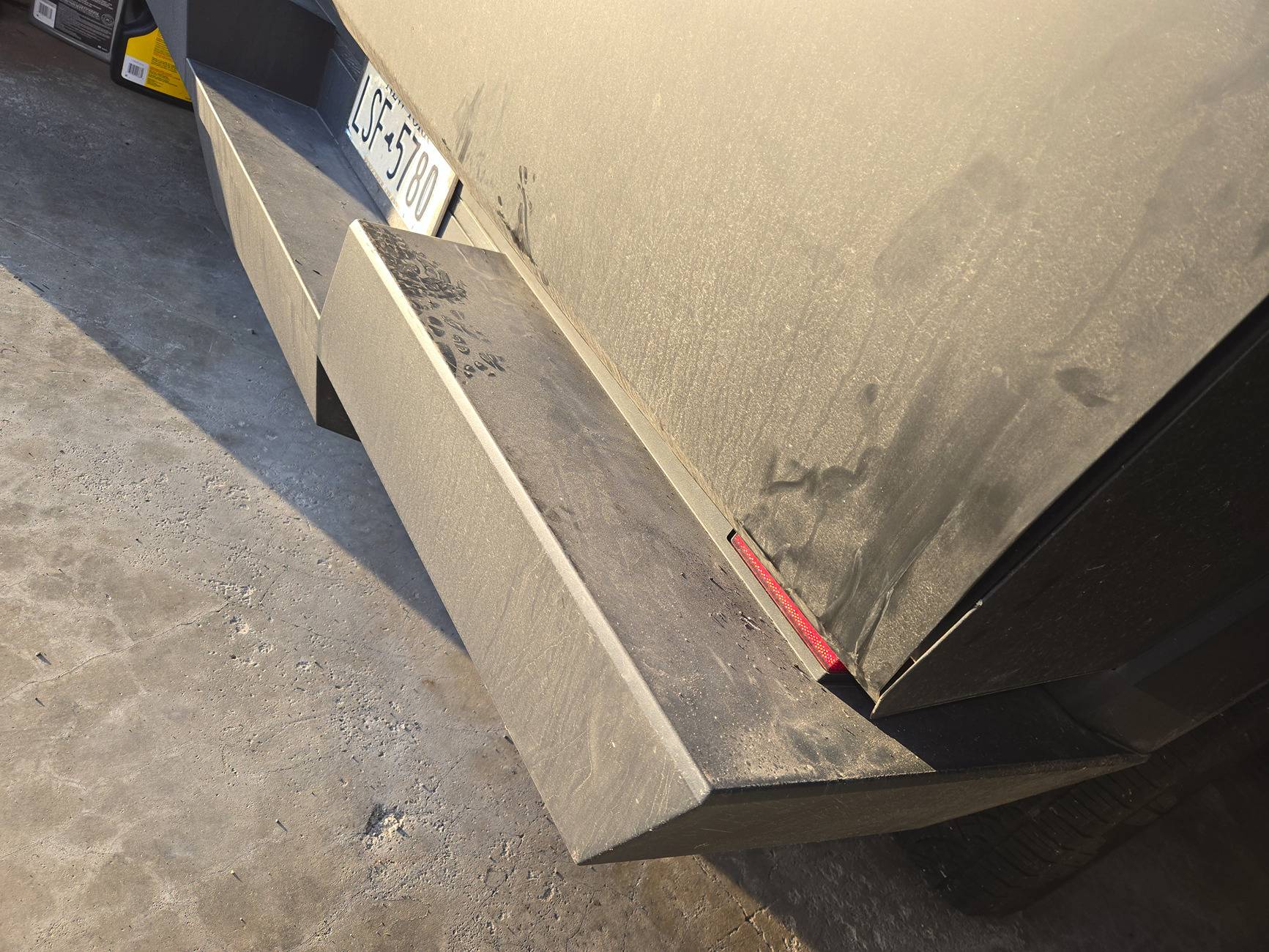 Tesla Cybertruck Warped tailgate issue after hauling load CTBent2