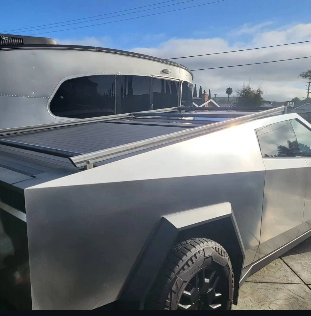 Tesla Cybertruck Just got a Trailmanor hard shell pop up camper -- towing stats Screenshot_20250429_064434_Instagram