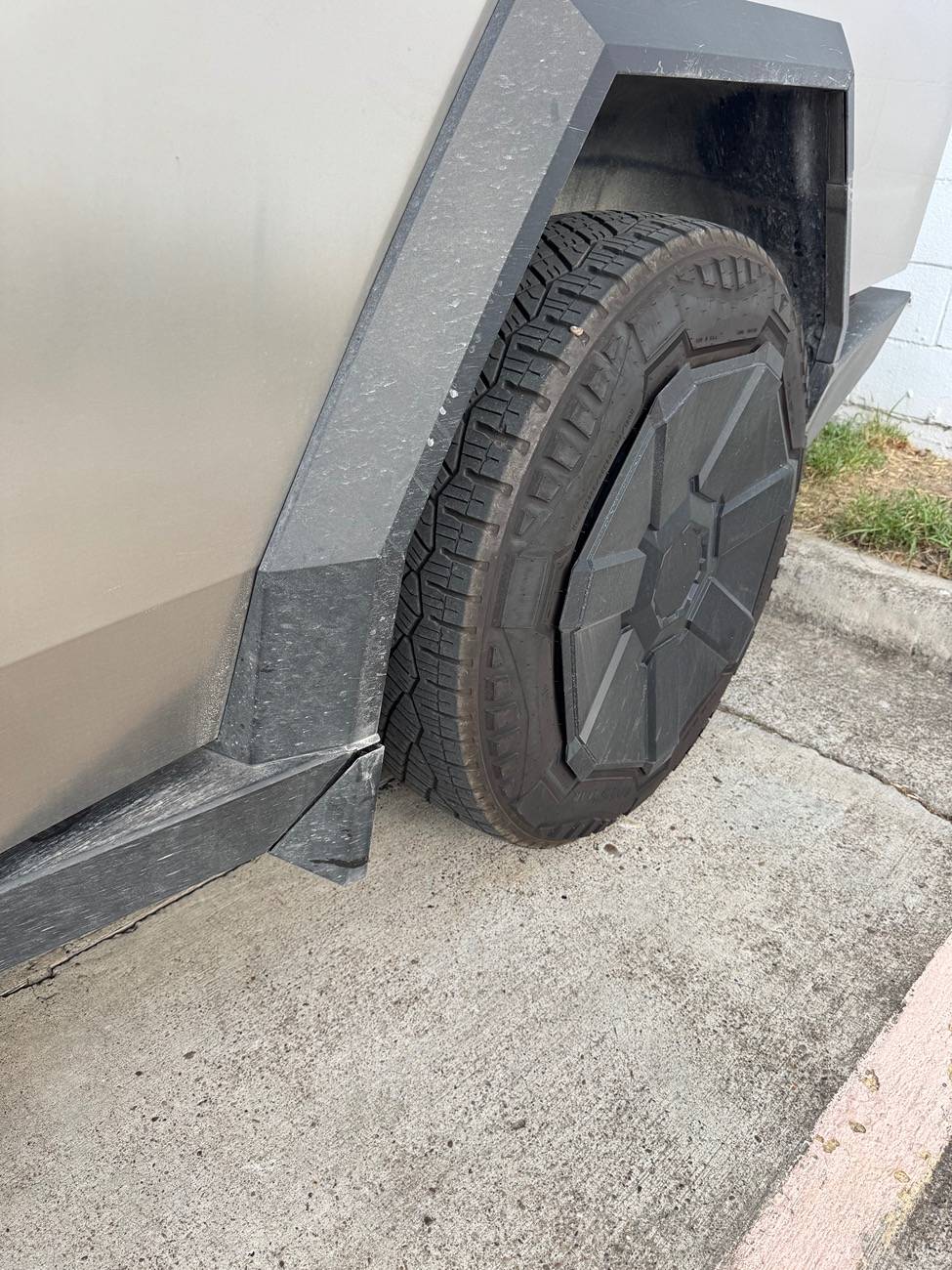 Tesla Cybertruck Small road debris keeps breaking mudflap. Aftermarket mud flap options? IMG_5348