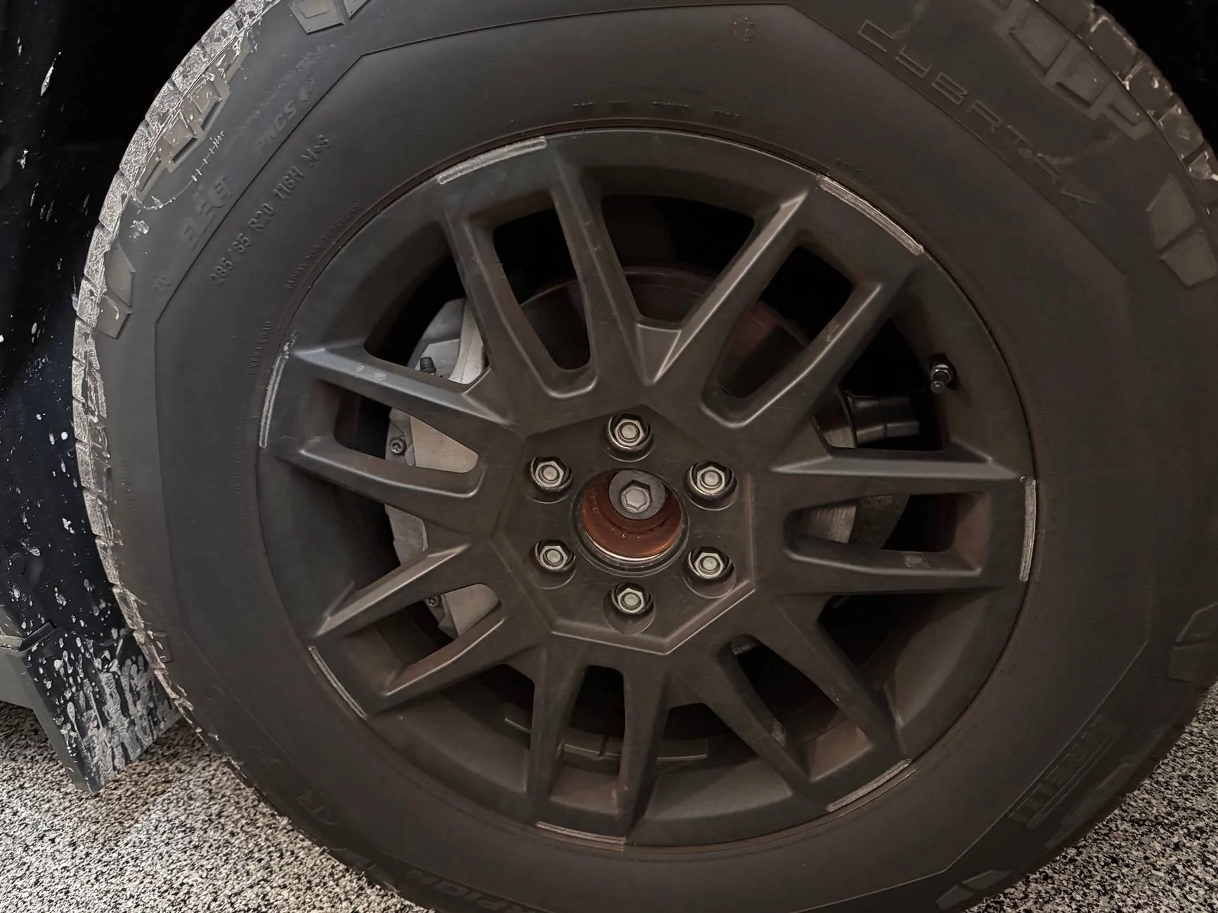 Tesla Cybertruck New wheel covers scratched all 4 of my rims IMG_5204