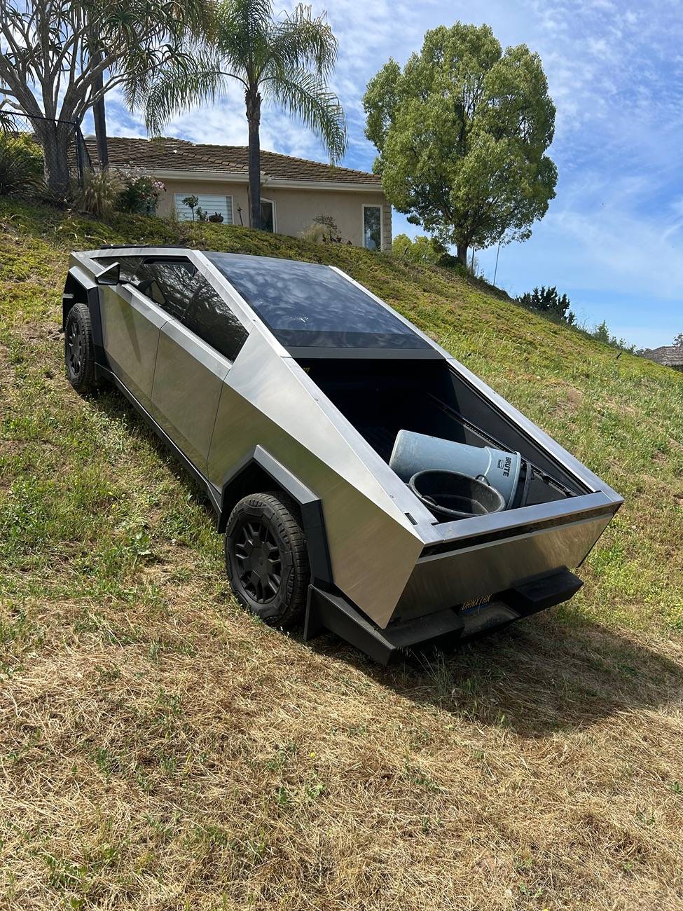 Tesla Cybertruck Aftermarket Sail Applique and Tailgate Cap in stainless steel for Cybertruck by JAM Specialty Products IMG_6392