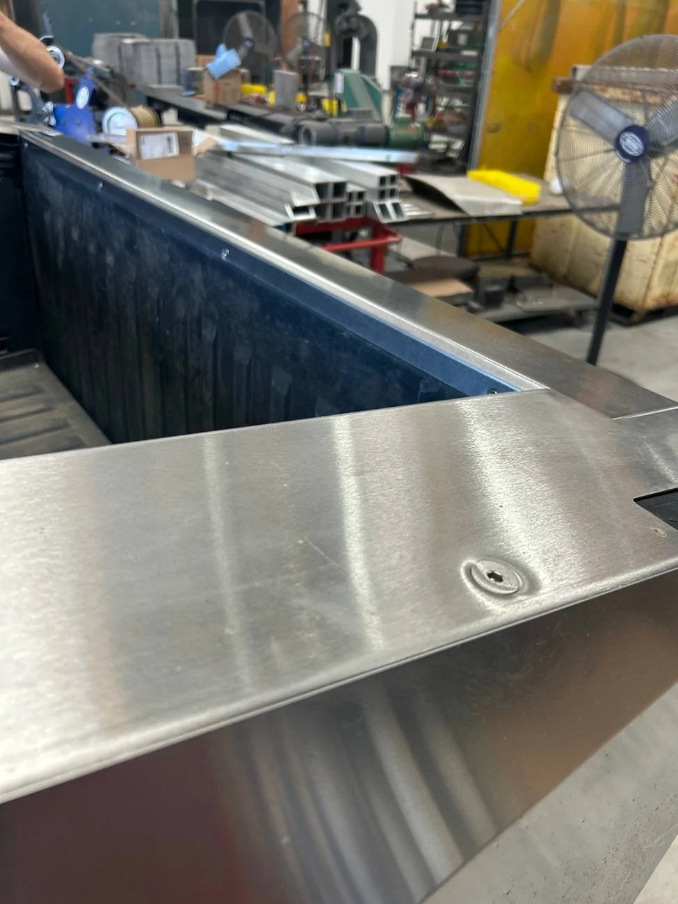 Tesla Cybertruck Aftermarket Sail Applique and Tailgate Cap in stainless steel for Cybertruck by JAM Specialty Products IMG_6431