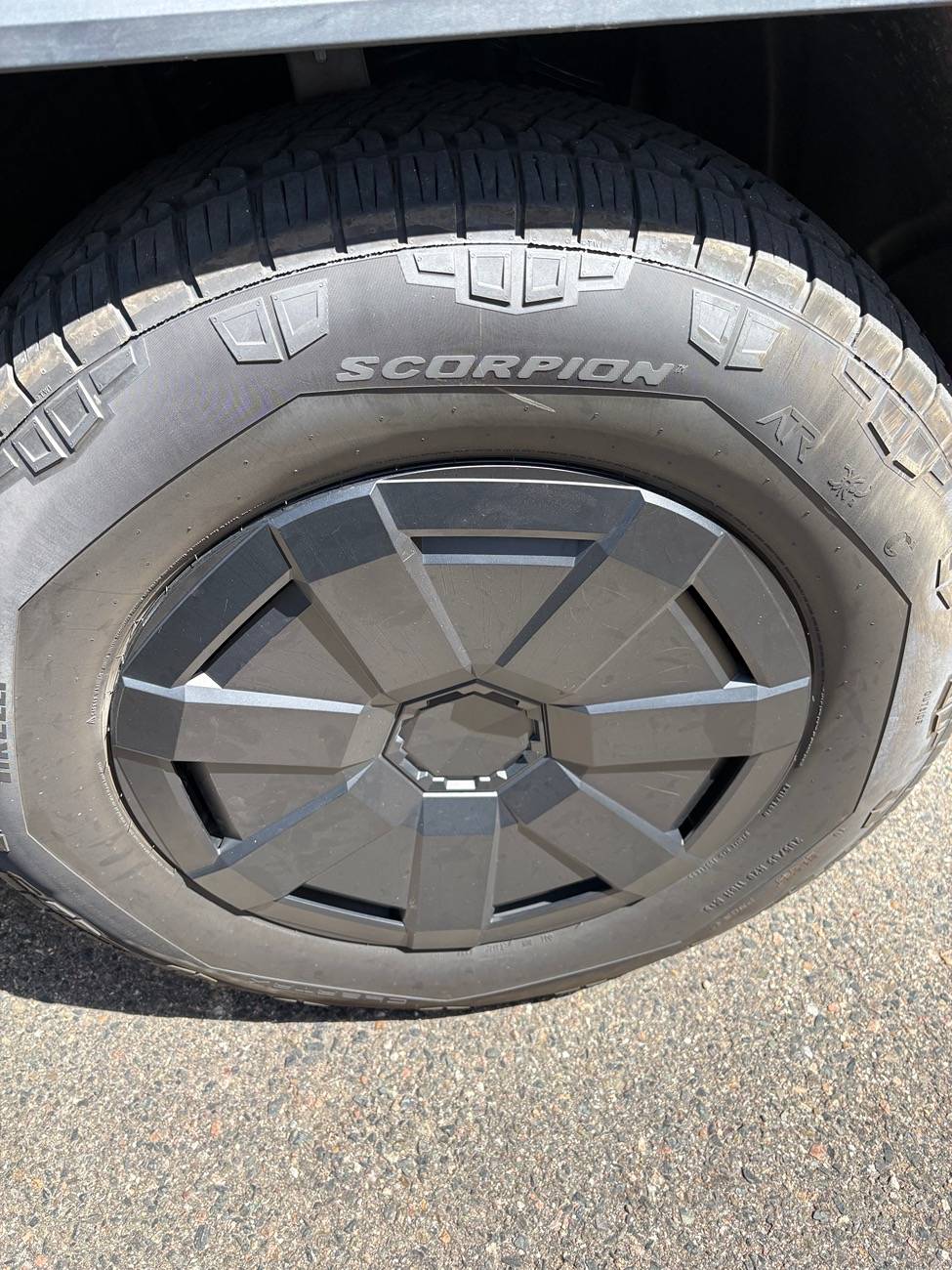 Tesla Cybertruck Wheel covers popping off... IMG_0134