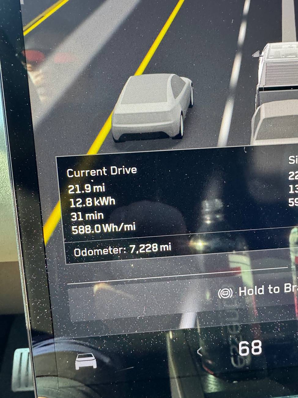 Tesla Cybertruck Just got a Trailmanor hard shell pop up camper -- towing stats IMG_2236