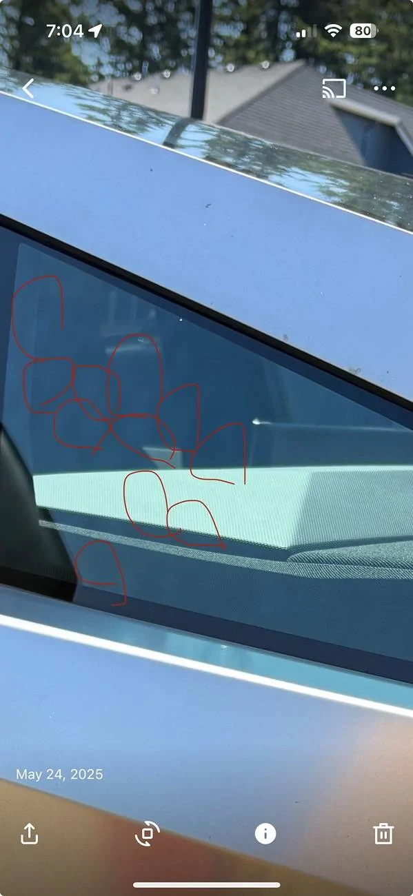 Tesla Cybertruck dark dots on the window IMG_1734