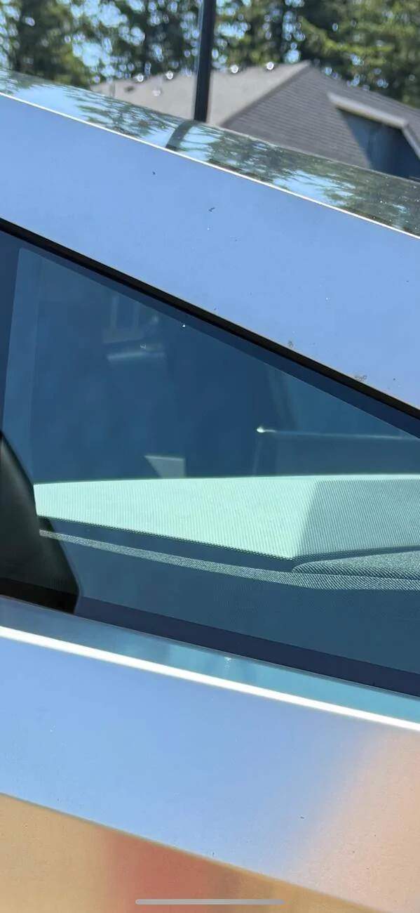 Tesla Cybertruck dark dots on the window IMG_1641