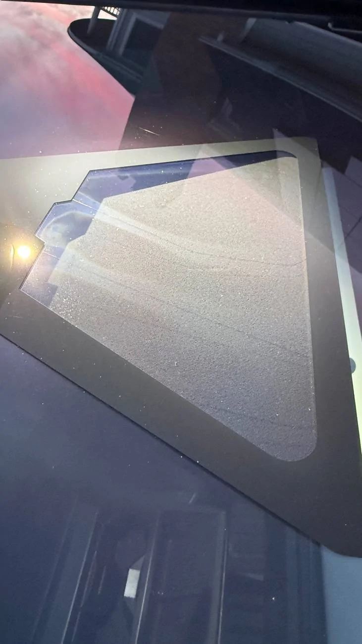 Tesla Cybertruck Glass (just cleaned at service) in front of camera has permanent haze inside IMG_3255