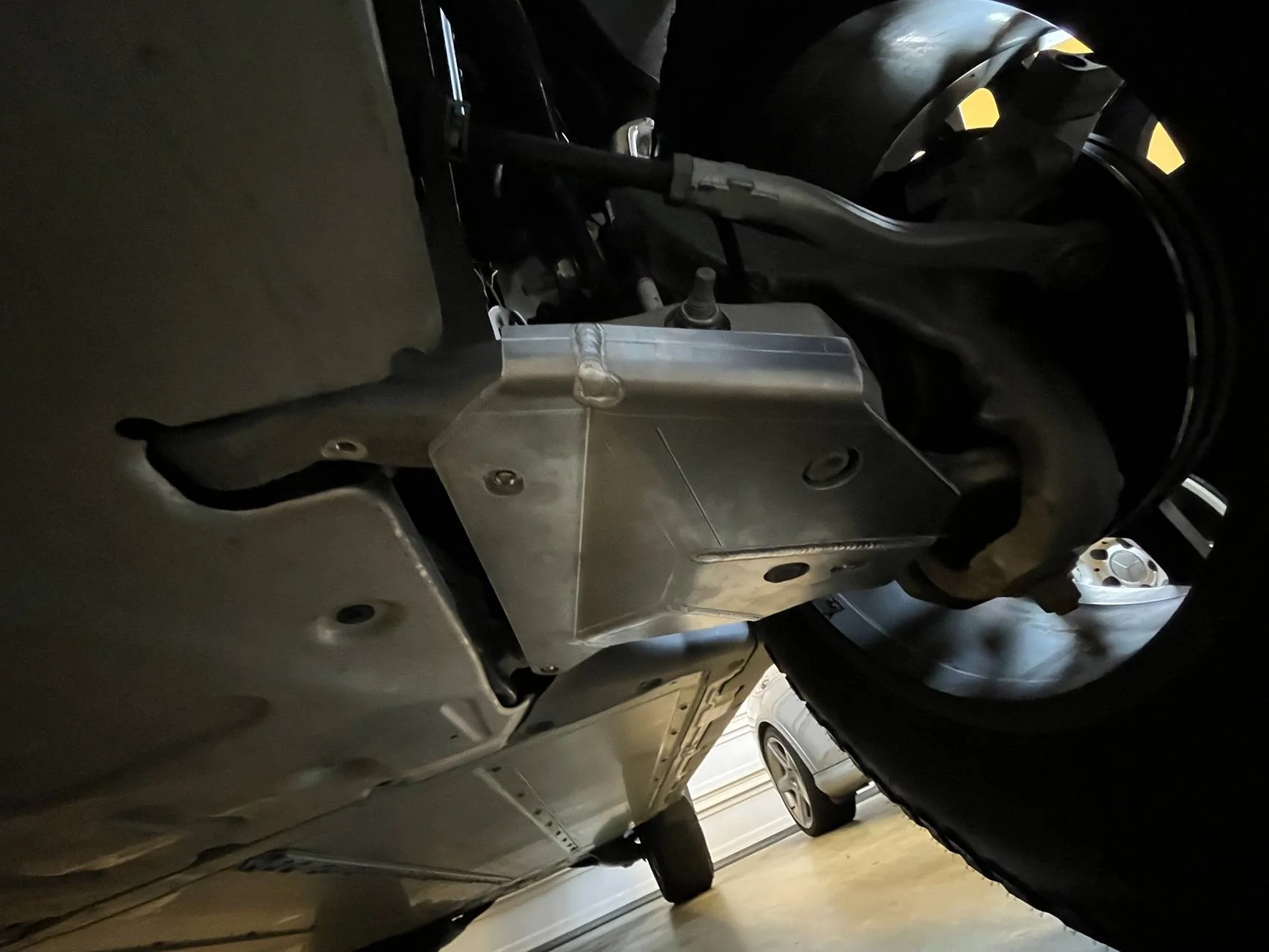 Tesla Cybertruck INSTALLED: Spoiler, Lowering links, Front Skid Plates (by CYBERTRUCKco) IMG_0815