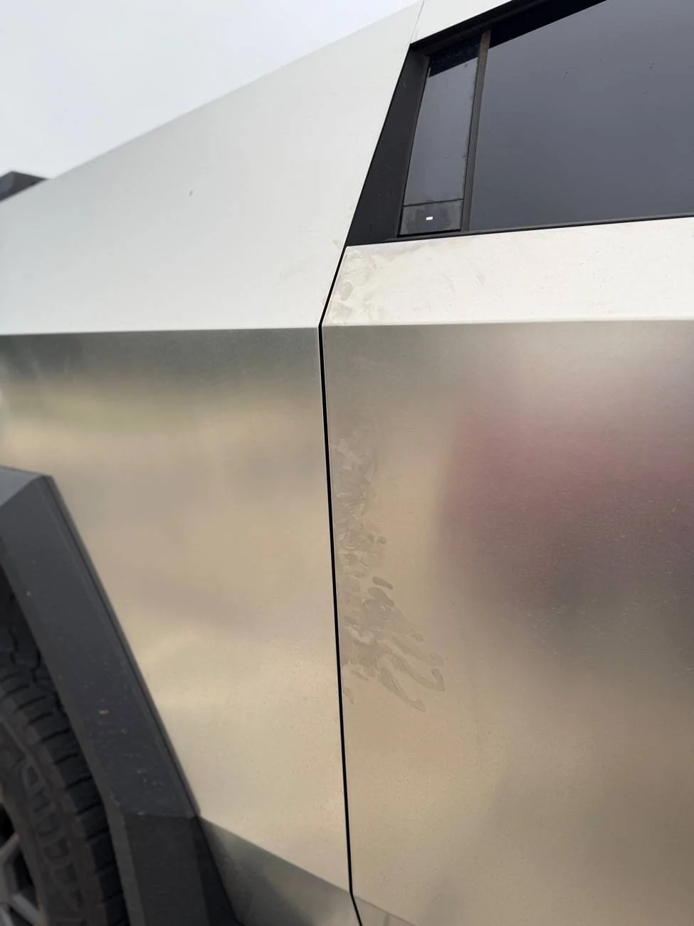 Tesla Cybertruck Iron X on panel “rust” spots after winter - Success! IMG_5749