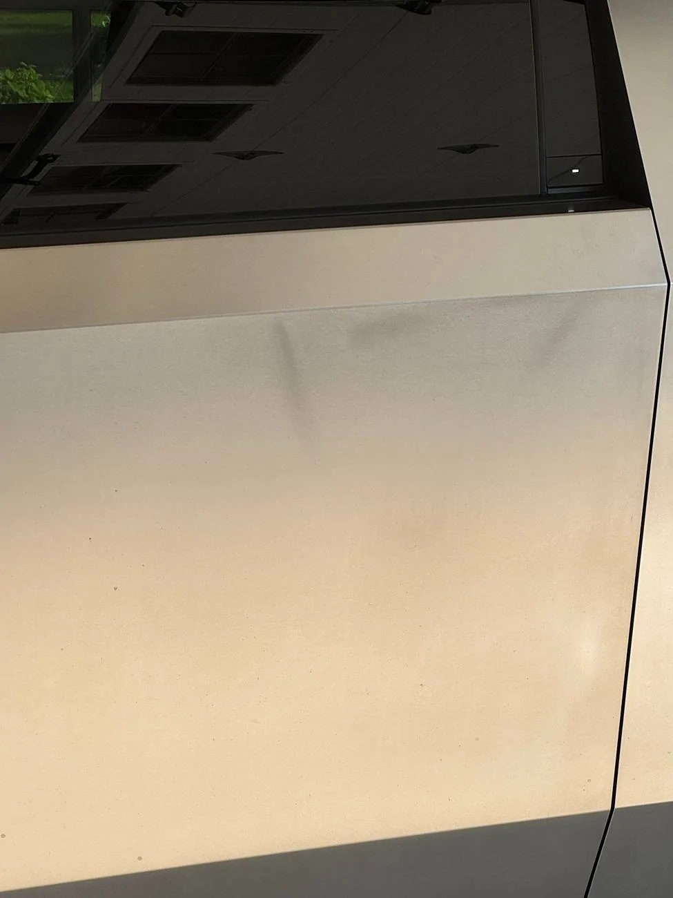Tesla Cybertruck Bought a used CT, BEST PURCHASE OF MY LIFE, but how to remove these spots from the door? IMG_6930