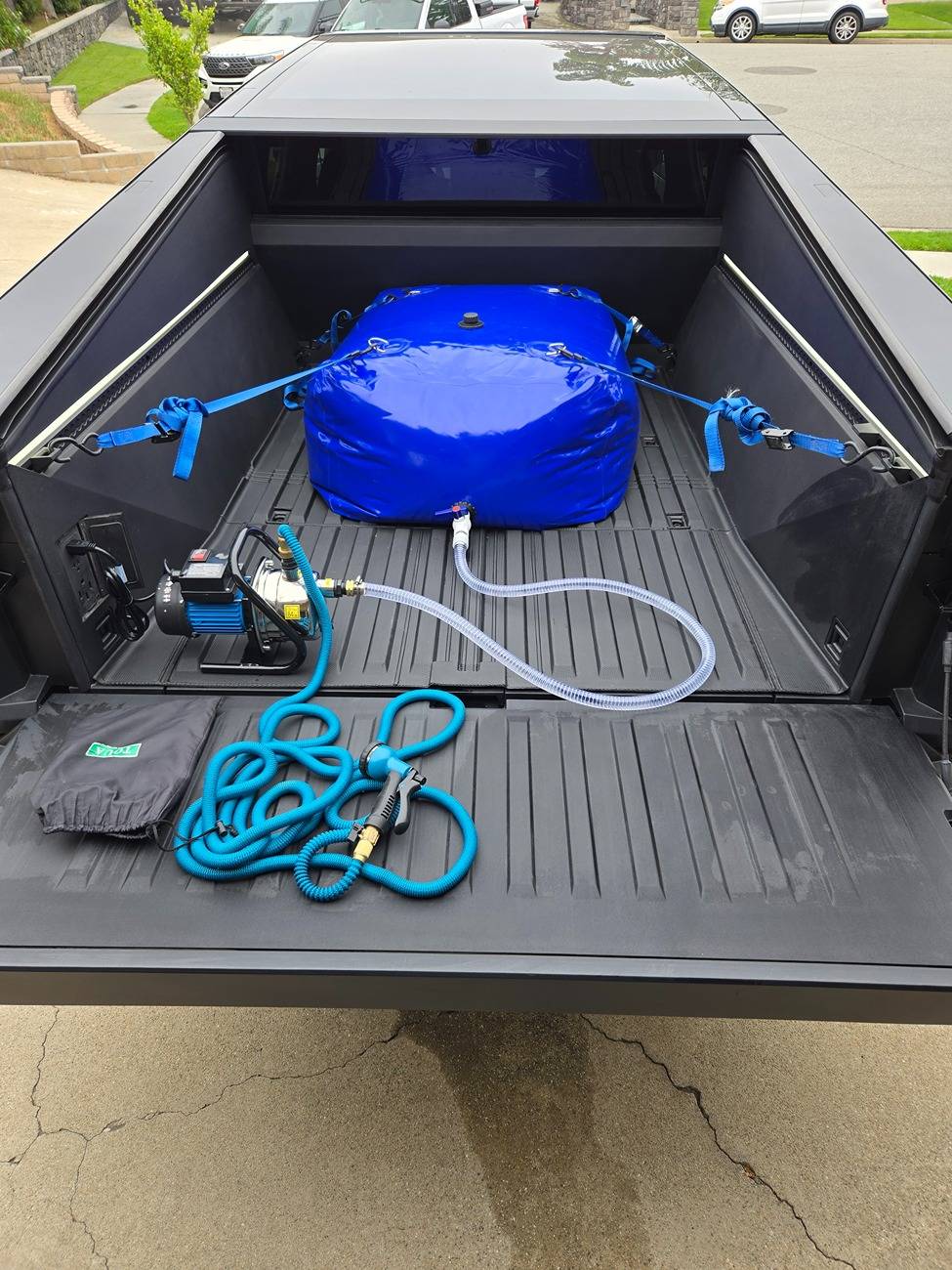 Tesla Cybertruck 💦 25-Gallon Smugglers Bay (Sub-Bed) Water Storage Bag Rinse Kit by CYBERTRUCKco - $399.95 20250523_083024[1]