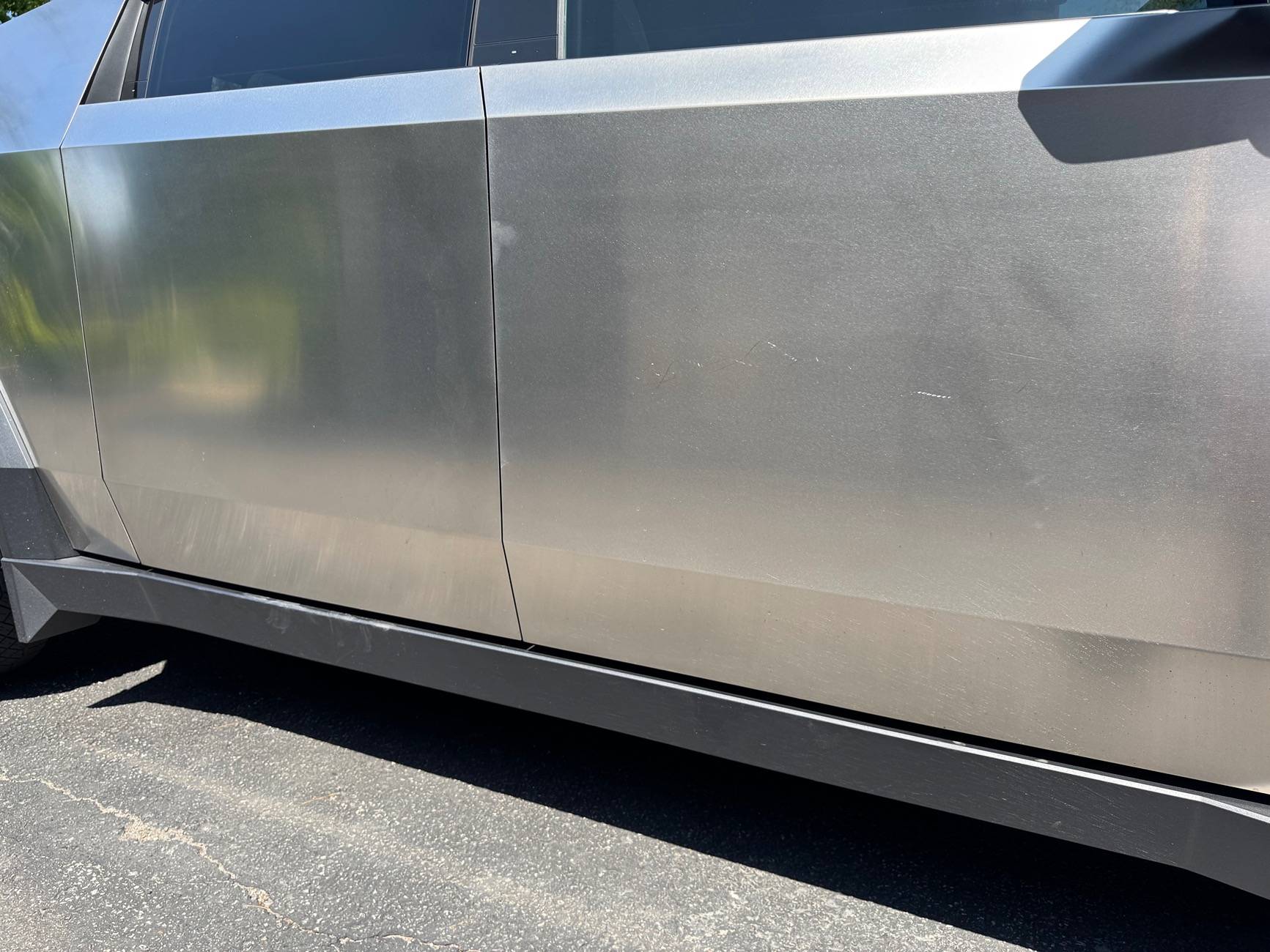 Tesla Cybertruck Did someone KEY my CT? No footage on sentry found.. IMG_7049