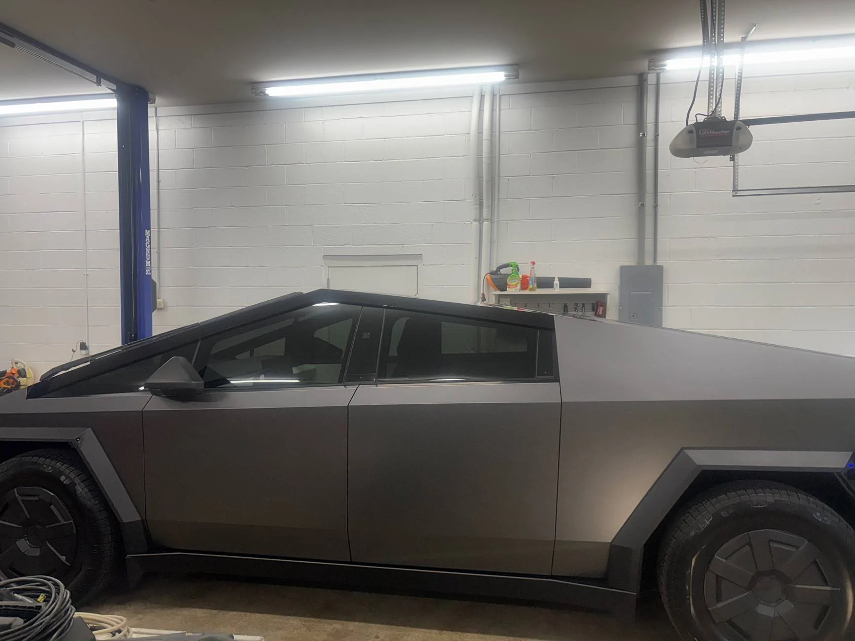 Tesla Cybertruck TWRAPS Matte Black Phantom Blue PPF wrap img_3614-jpeg