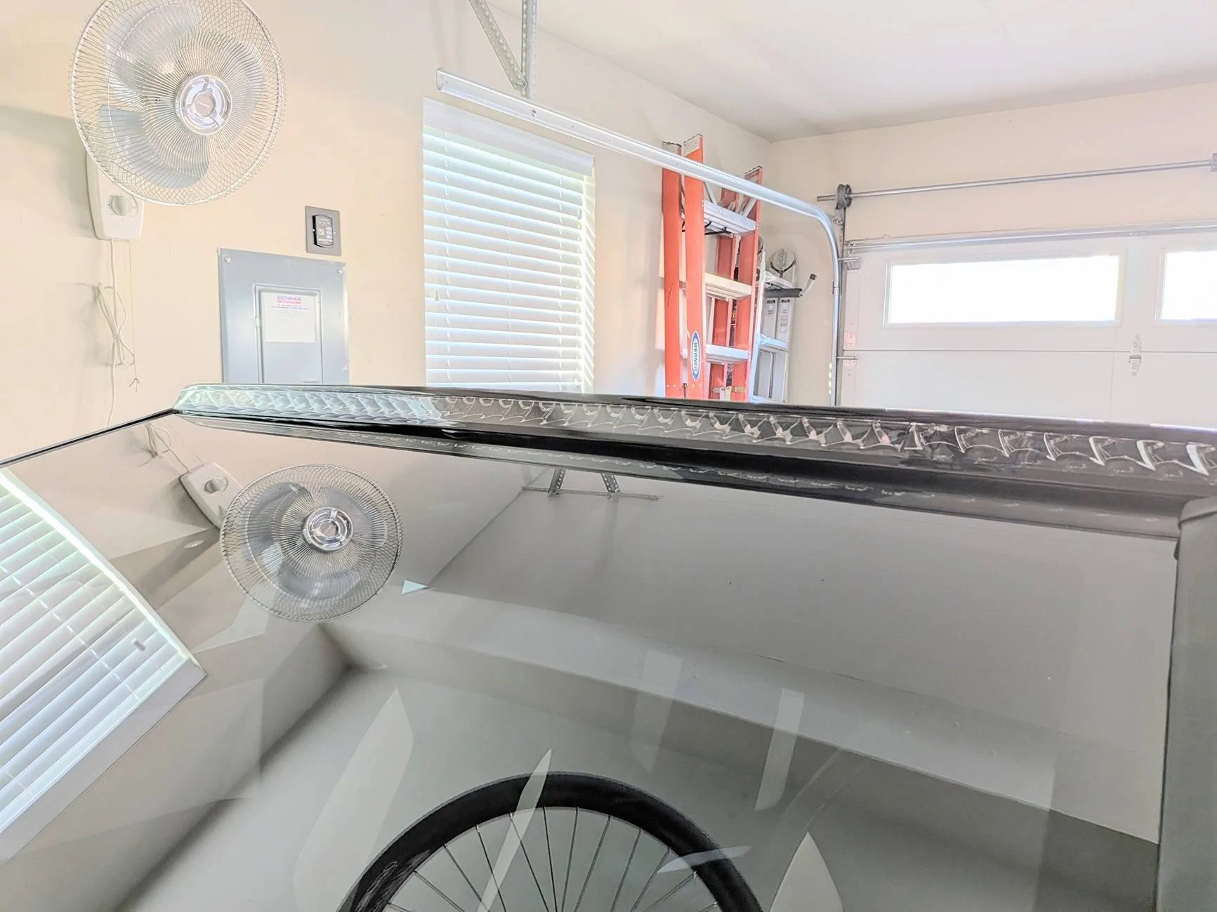 Tesla Cybertruck Adding black RTV to the light bar PXL_20250618_021025577~2
