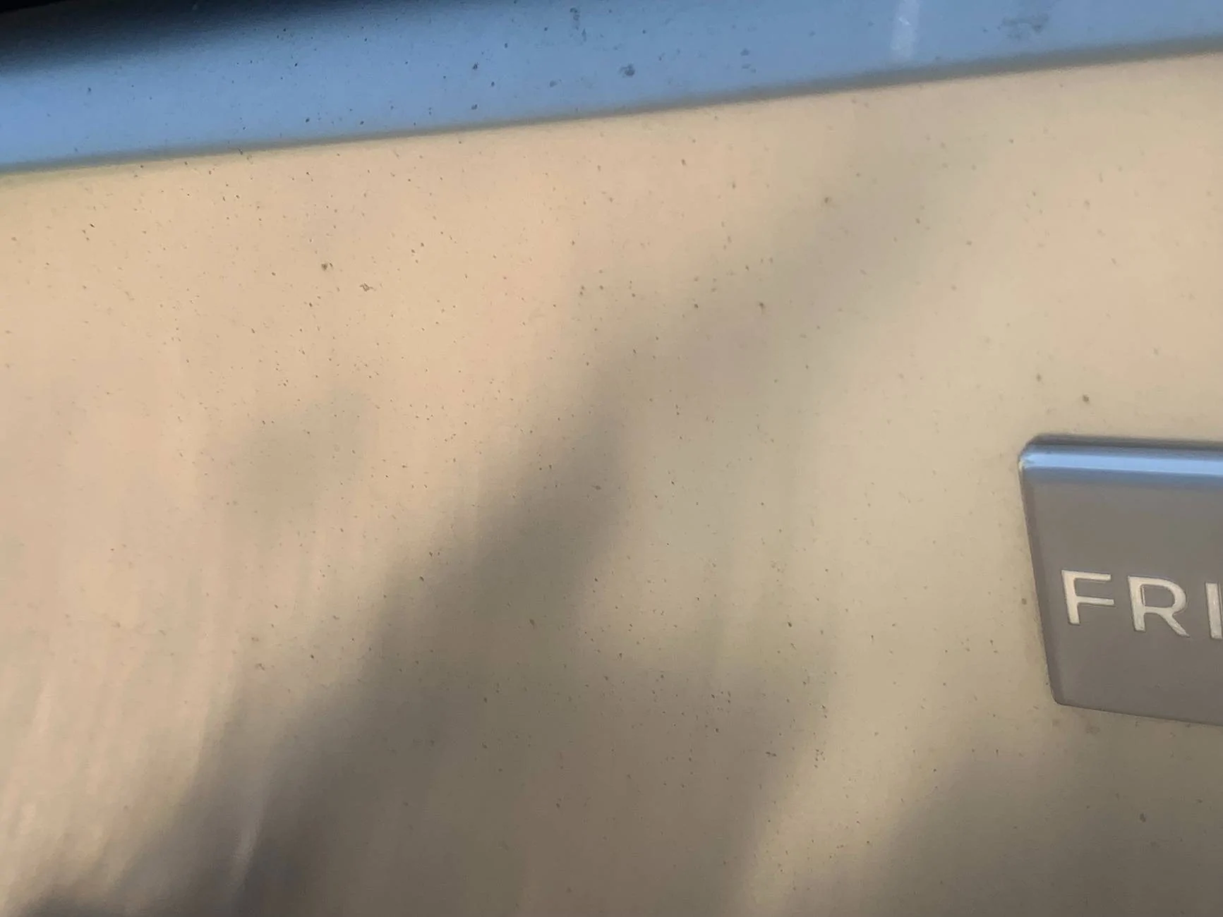 Tesla Cybertruck Iron X on panel “rust” spots after winter - Success! ct1