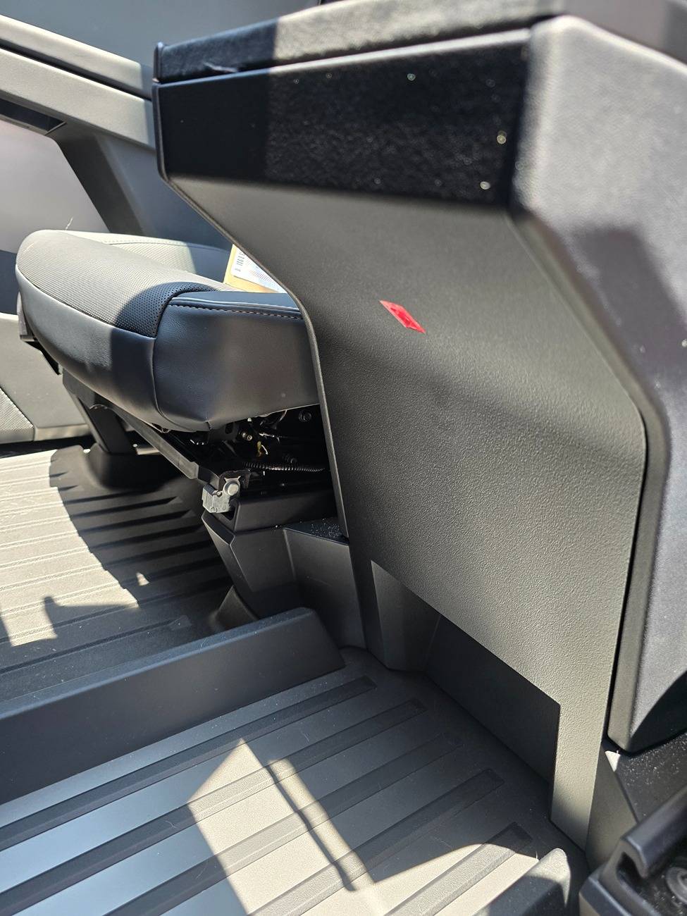 Tesla Cybertruck HARDWARE FIX for hot phone charging issue! New wireless charger has a built-in heatsink 20250626_133454