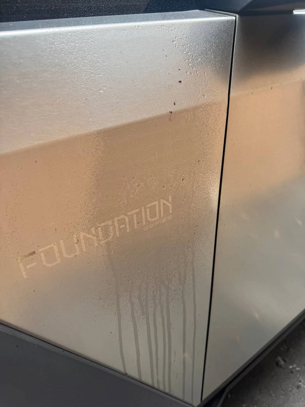 Tesla Cybertruck Bird poop etched my truck IMG_3312