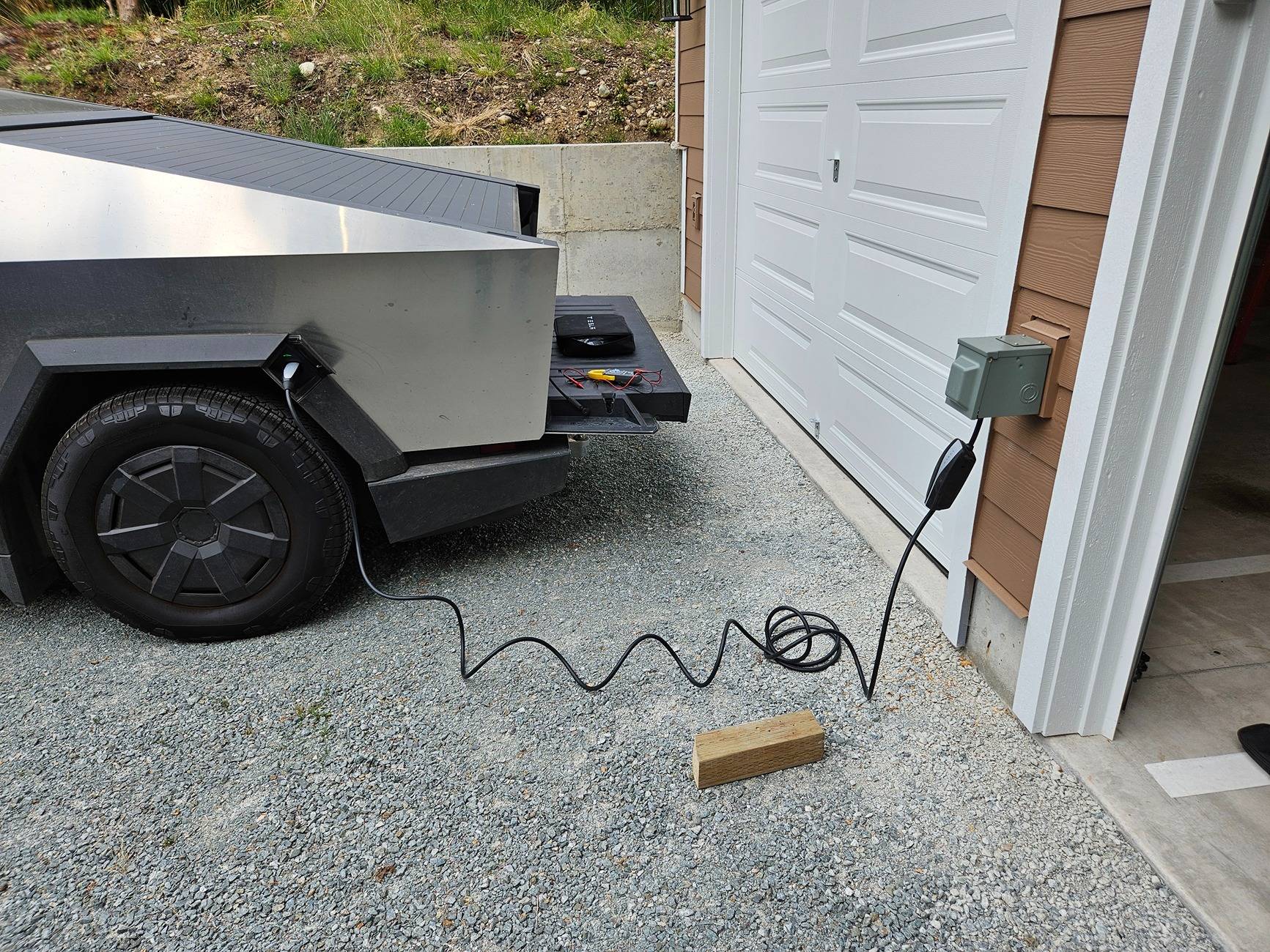 Tesla Cybertruck Instead of PowerShare, I installed an interlock and 50amp receptacle... 1000069506