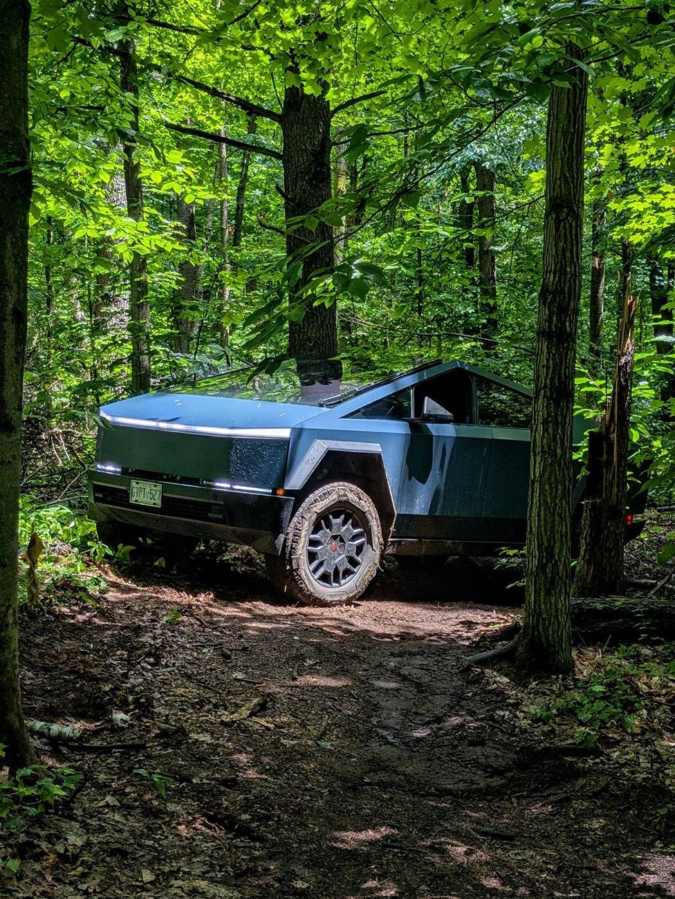 Tesla Cybertruck Photoshoot: Cybertrucks Off-Roading in The Woods cybertrucks offroading woods 7