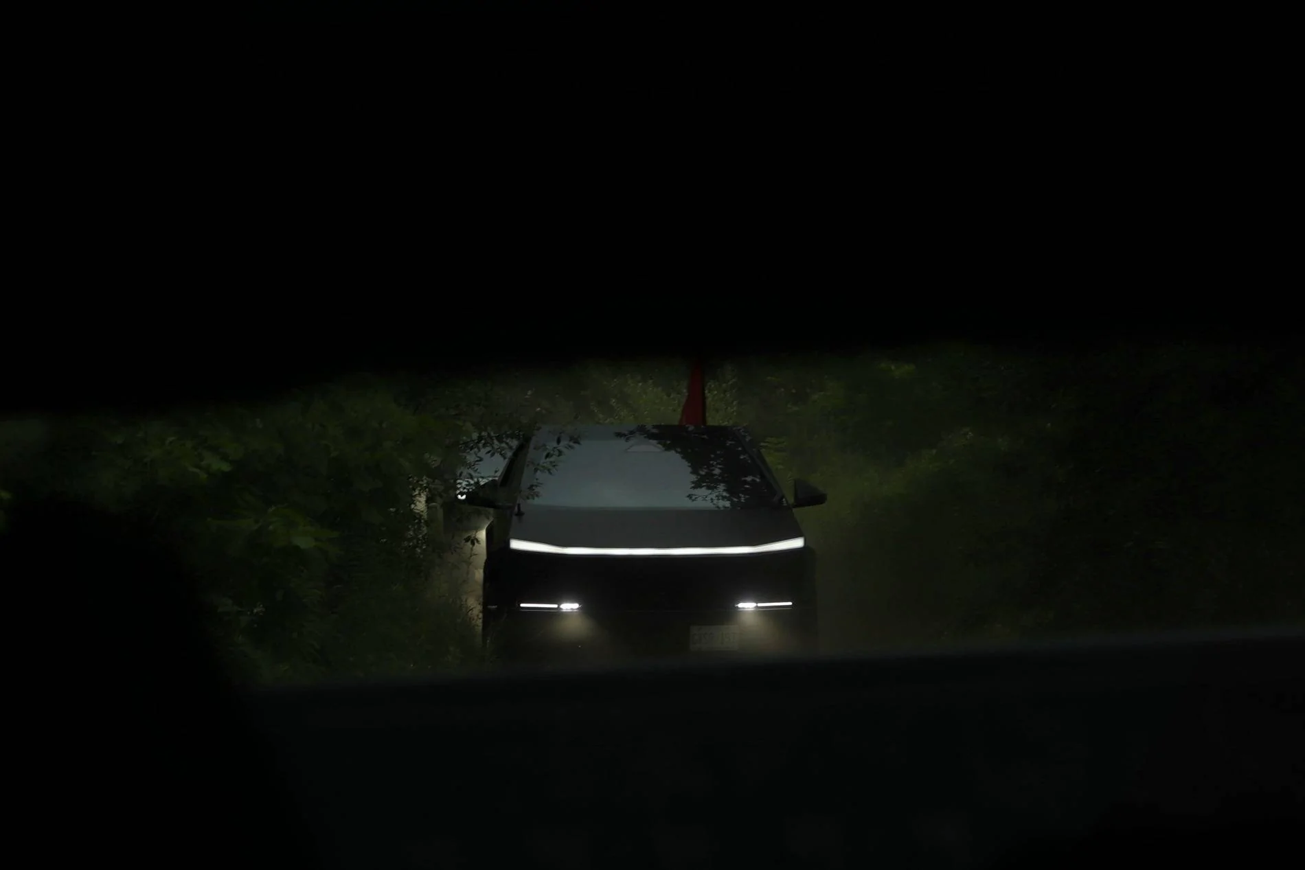Tesla Cybertruck Photoshoot: Cybertrucks Off-Roading in The Woods cybertrucks offroading woods 5