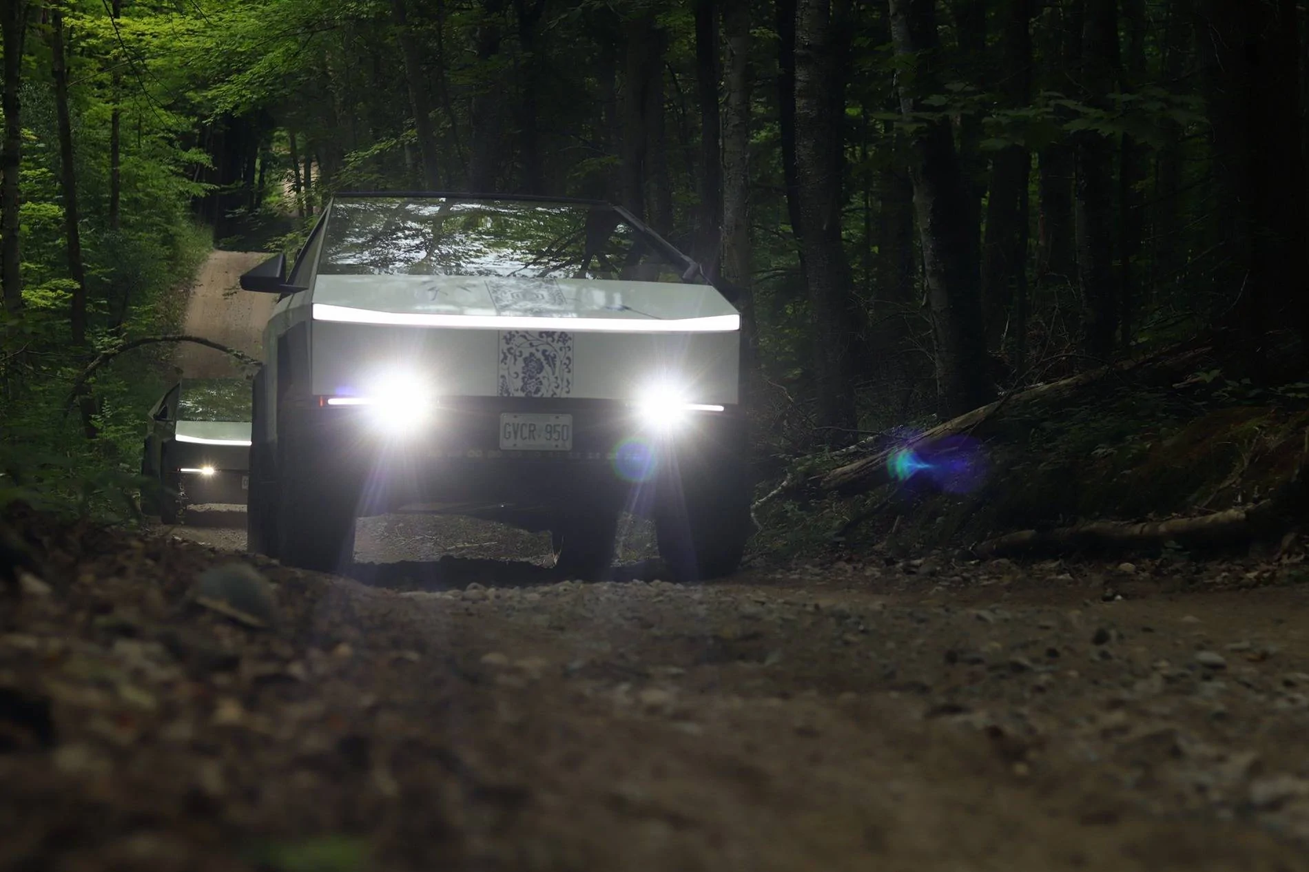 Tesla Cybertruck Photoshoot: Cybertrucks Off-Roading in The Woods cybertrucks offroading woods 2