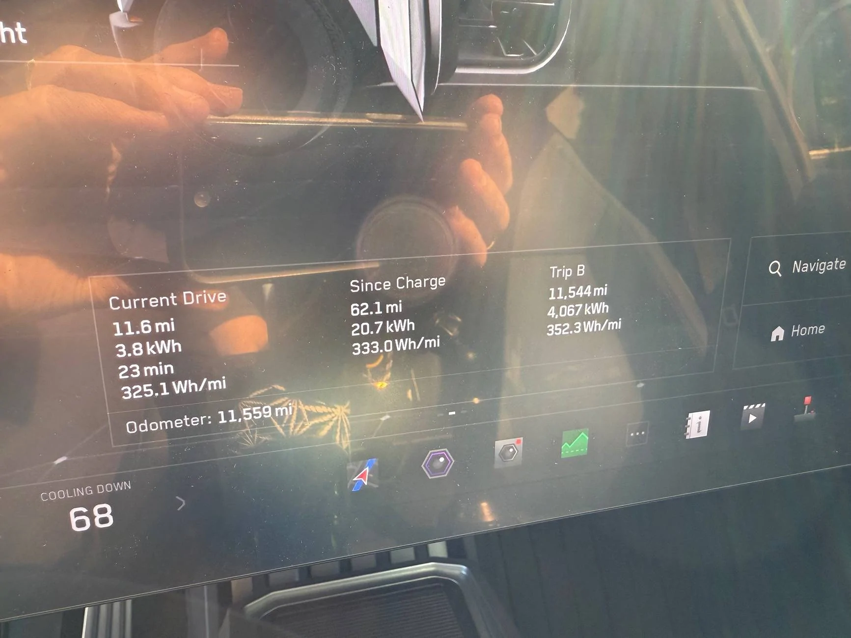 Tesla Cybertruck Charge stats vs. energy usage 1 yr shows about 30% overhead IMG_6404