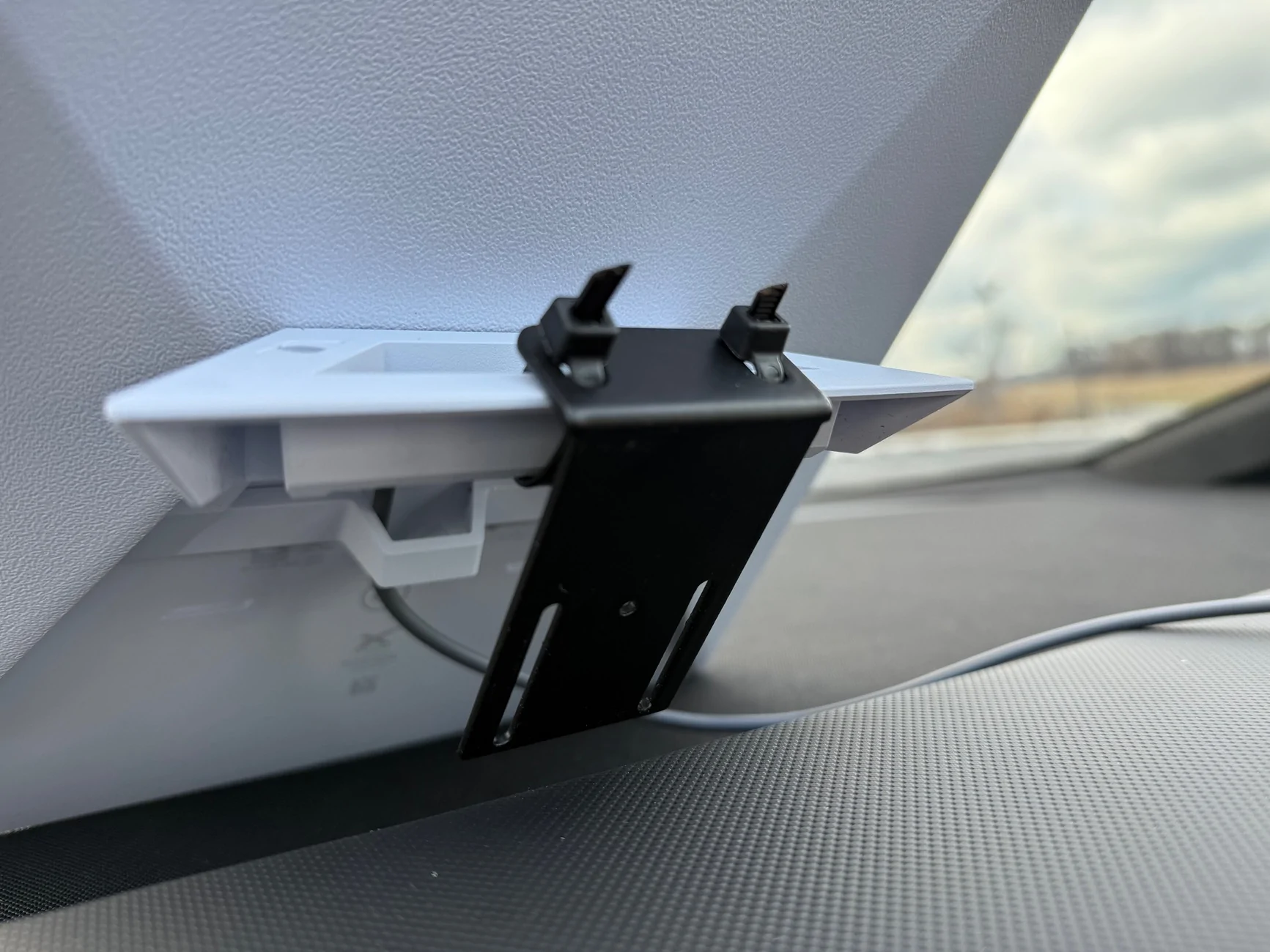 Tesla Cybertruck Starlink wiring through crossbar door IMG_0648