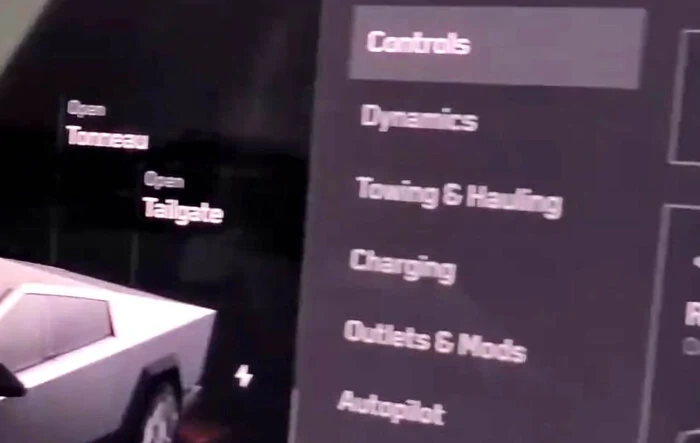 Cybertruck Menu Controls (Dynamics, Towing & Hauling, and Outlets & Mods) seen in video