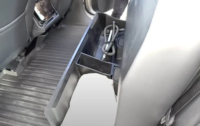 Storage boxes accessory below 2nd row seat when folded up