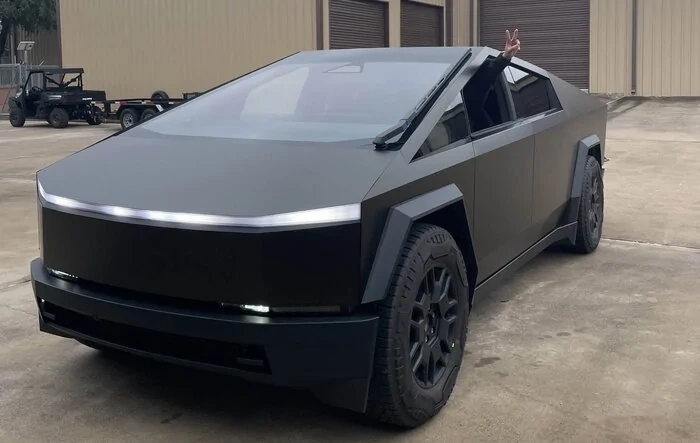 Matte black Cybertruck with mirrors removed... talk about sleek!